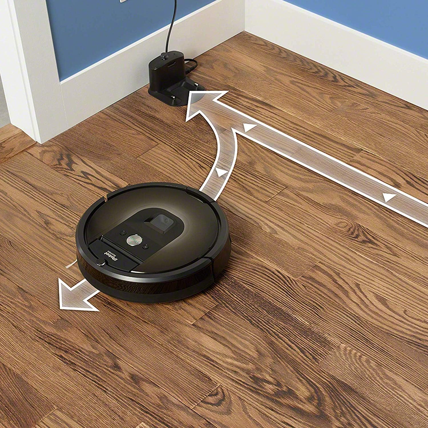 iRobot Roomba 980 robot vacuum returning to its charging base, showing its path.