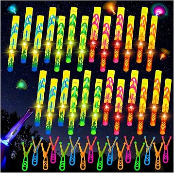 25 Pack Slingshot Rocket Launcher LED Flying Toys Set for Kids | 25 Slingshot+ 25 Glow Helicopter, Rocket Toys Outdoor Game Glow in The Dark Party Supplies Party Favors for Kids 4-8 8-12