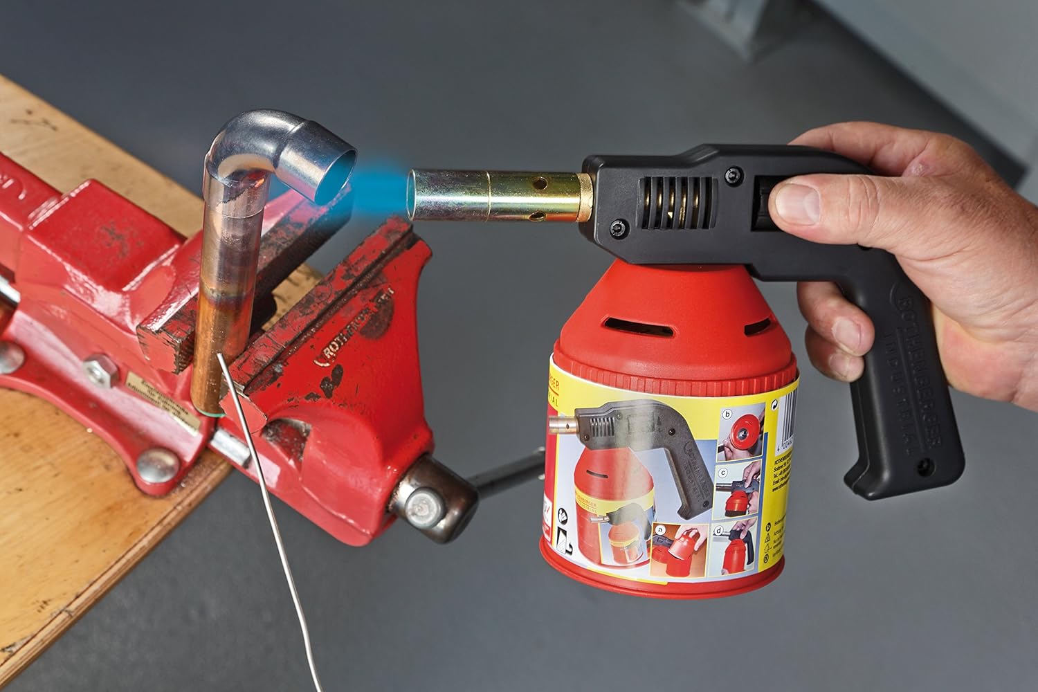 Rothenberger Industrial Blowtorch in use for soldering a pipe