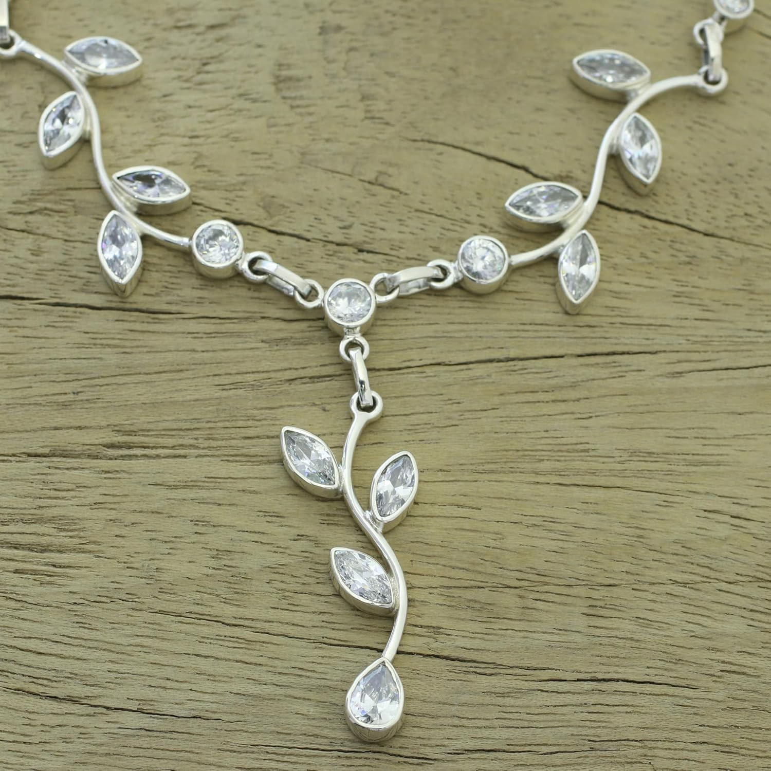 NOVICA Artisan Quartz Y Necklace Garland in Sterling Silver from India Clear Leaf Tree Birthstone [17.25 in min L x 18 in max L x 0.5 in W 2 mm W Pendant(s) 2 in L x 0.6 in W x 0.1 in D] '