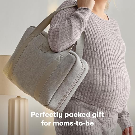 Frida Mom 30pc Pre-Packed Hosptial & Baby Essentials Travel Bag, Includes C-Section Delivery & Recovery Must Haves, Newborn Grooming Kit, Easy to Organize, Removable Toiletry Bags & Suitcase Strap