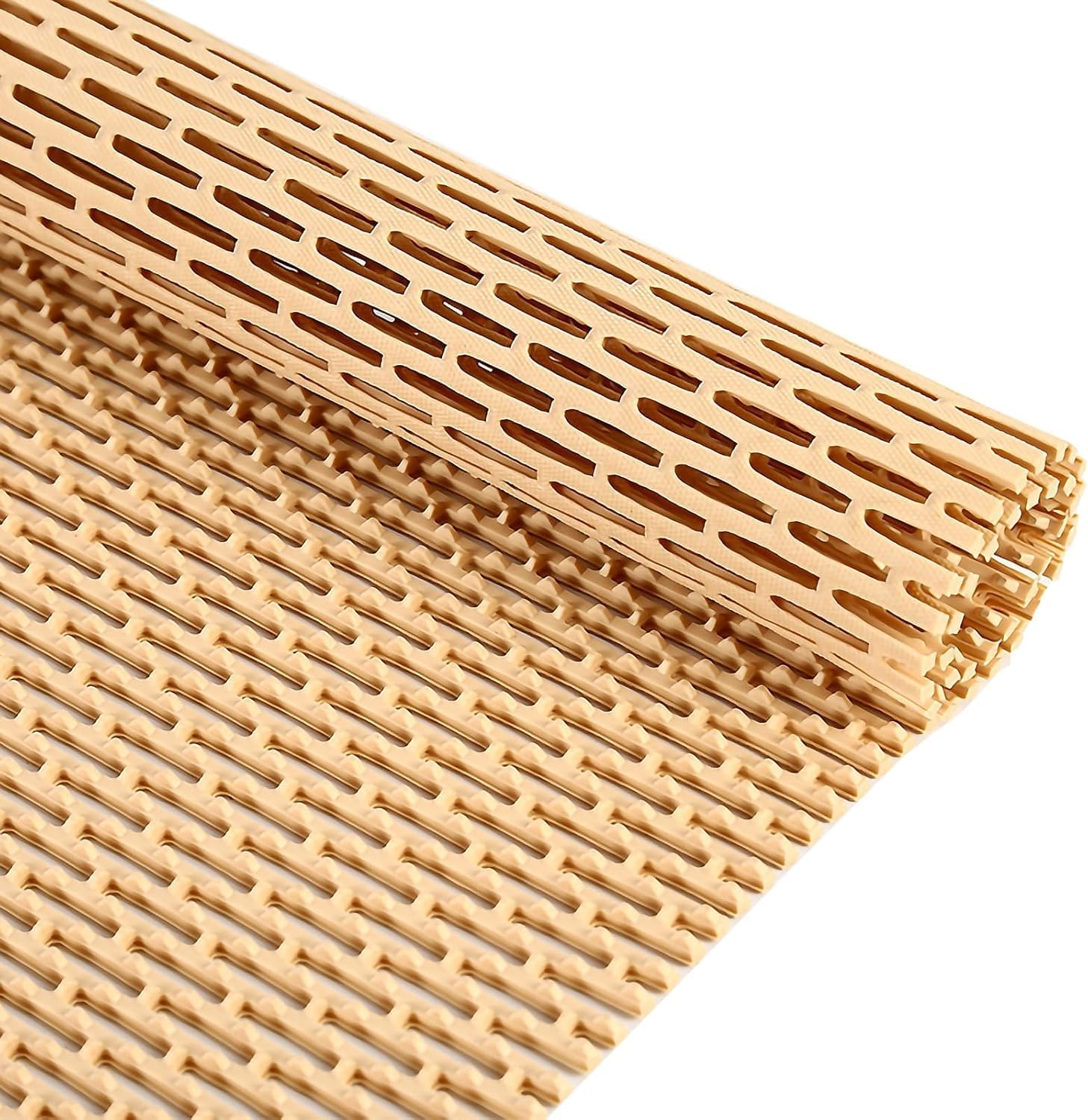 Tapis de douche antidérapant en PVC ajouré pour sécuriser le sol des toilettes