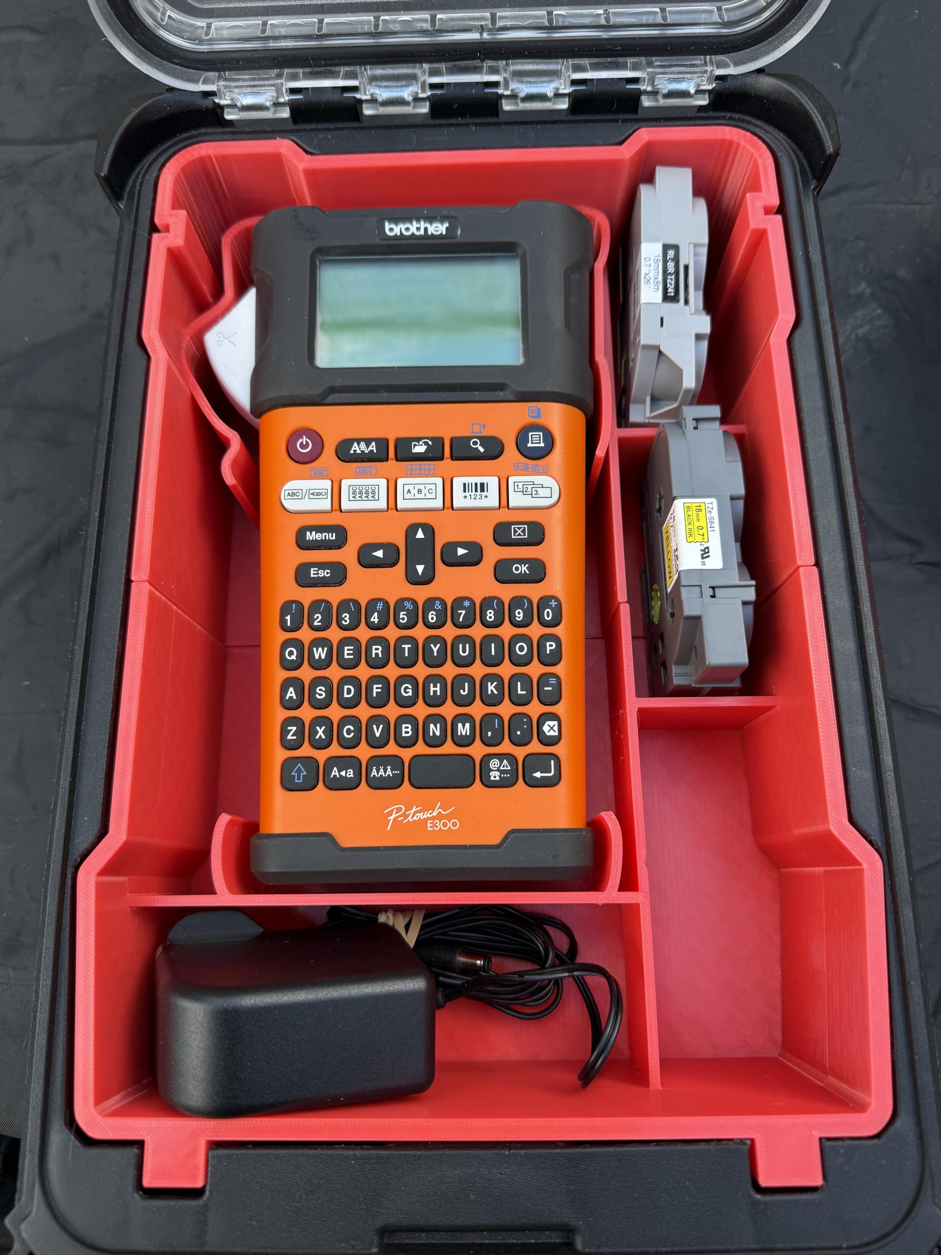 3D printed custom plastic insert to fit the Packout Compact Organiser compatible with the Brother PT-E300VP Label Printer