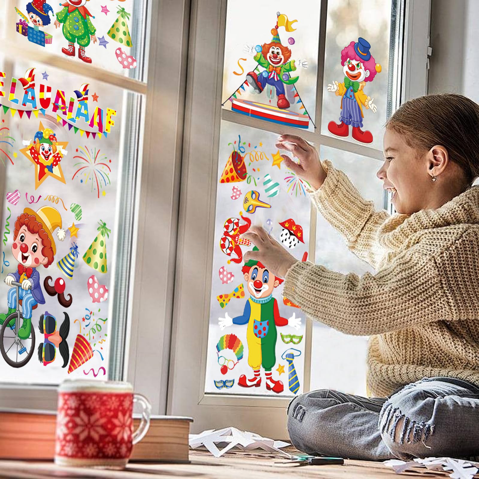 Twee gouden elektrostatische glasstickers in de vorm van een kerstboom