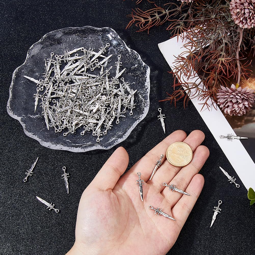 DICOSMETIC 120Pcs Alloy Sword Charms Pendants Metal Dagger Charms 29x9mm Small Long Sword Charm Antique Silver Tibetan Charm for Bracelet Necklace Earring Jewelry Making - Image 3