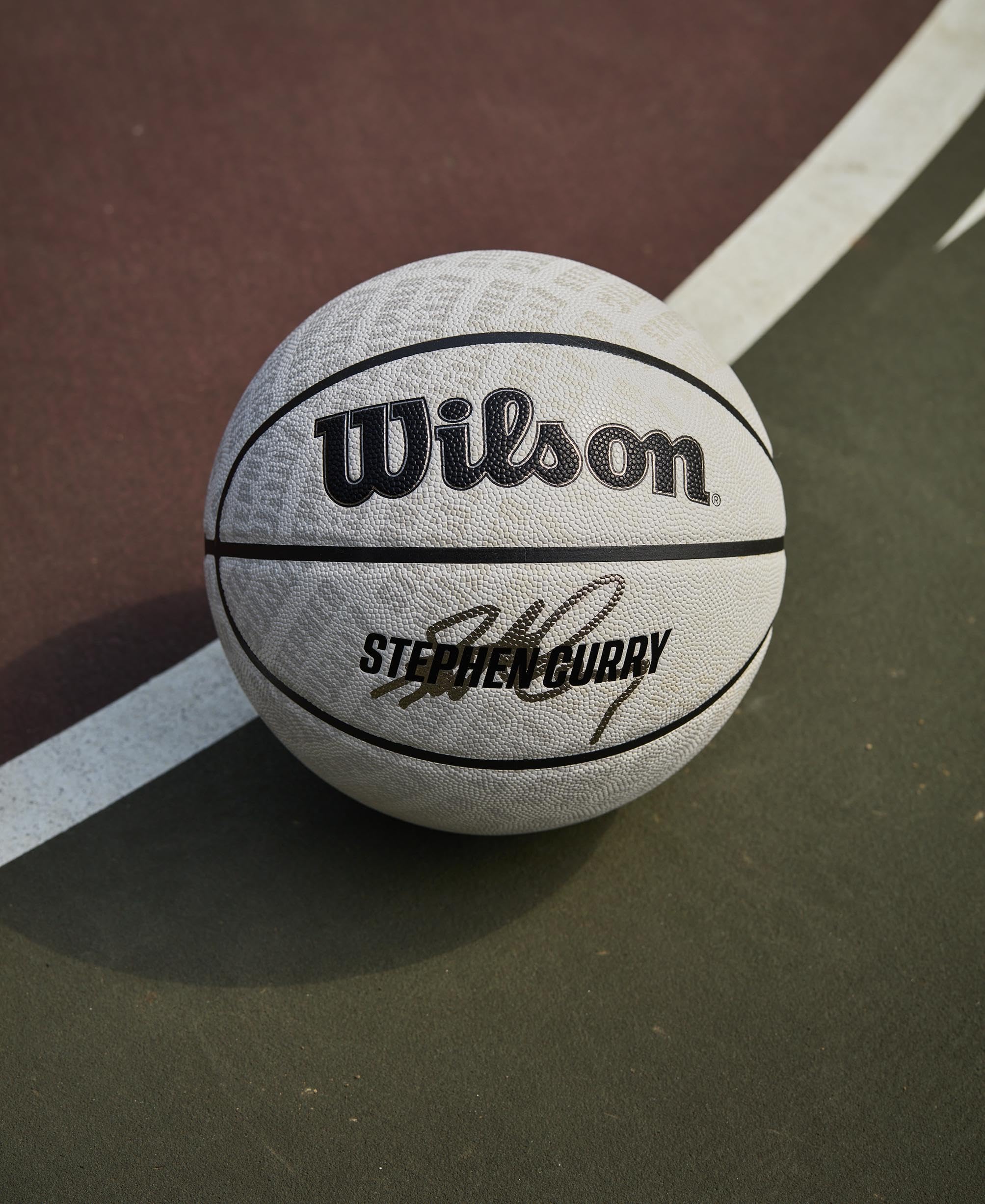 Wilson NBA Player Icon UV Basketball, Stephen Curry Design, Mit UV-Schutz und Pure Feel Textur, True Grip Beschichtung und zuverlässiger Bounce, Farbe: Grau, Größe: 7