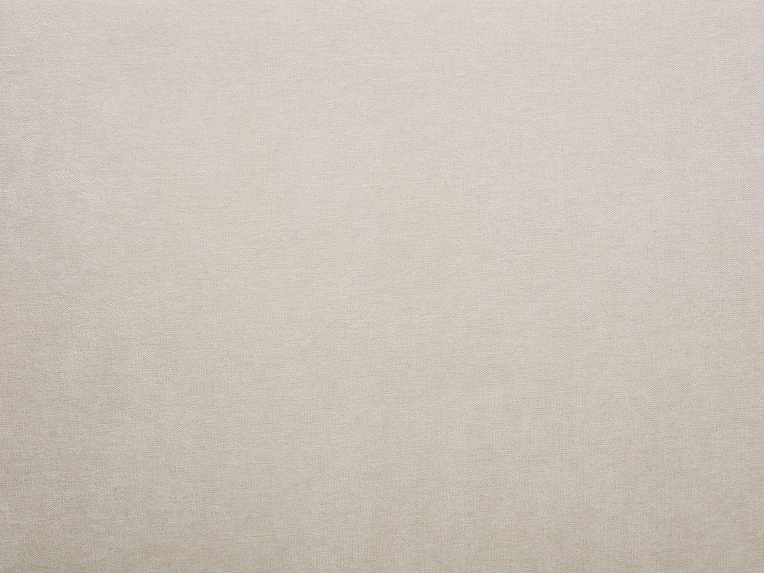 Close-up of the beige fabric texture of the BENEDICTE bed