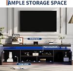 Meuble TV LED pour téléviseurs de 75/80/85 po, centre de divertissement moderne à haute brillance avec prises de courant, lumières LED RGB et étagères de rangement en verre, table console multimédia pour le salon et la chambre, noir