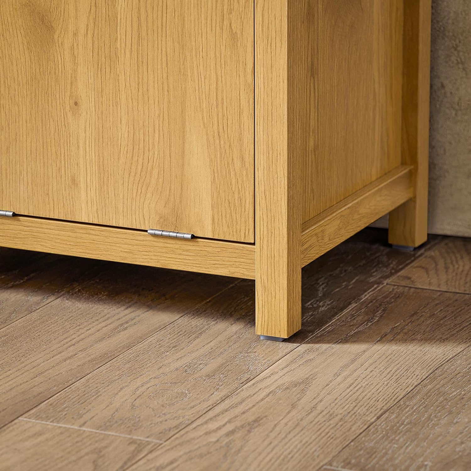 Close-up of the base of the SoBuy BZR96-SN Laundry Unit showing the foot pads and the sturdy construction.