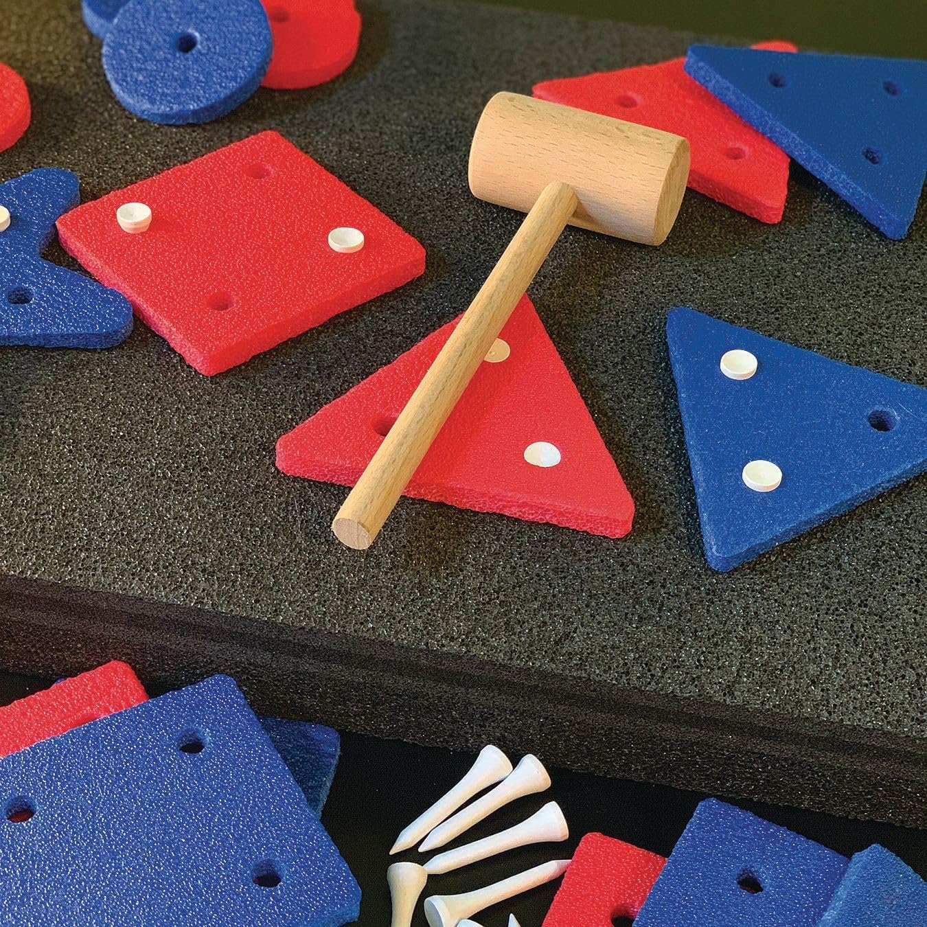 S&S Worldwide Foam Pounding Board Activity Set. Drive Wooden Tees Through Any of 10 Shapes into the Self Healing 12" x 18" Foam Board with the Wooden Mallet. Great Stress Relief Item for Seniors.