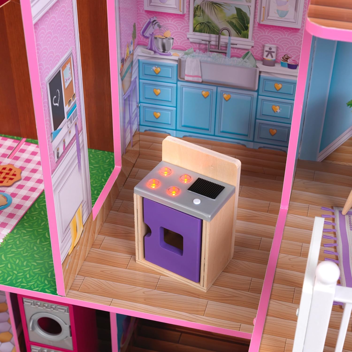 Close-up of the dollhouse stove with lights and sounds