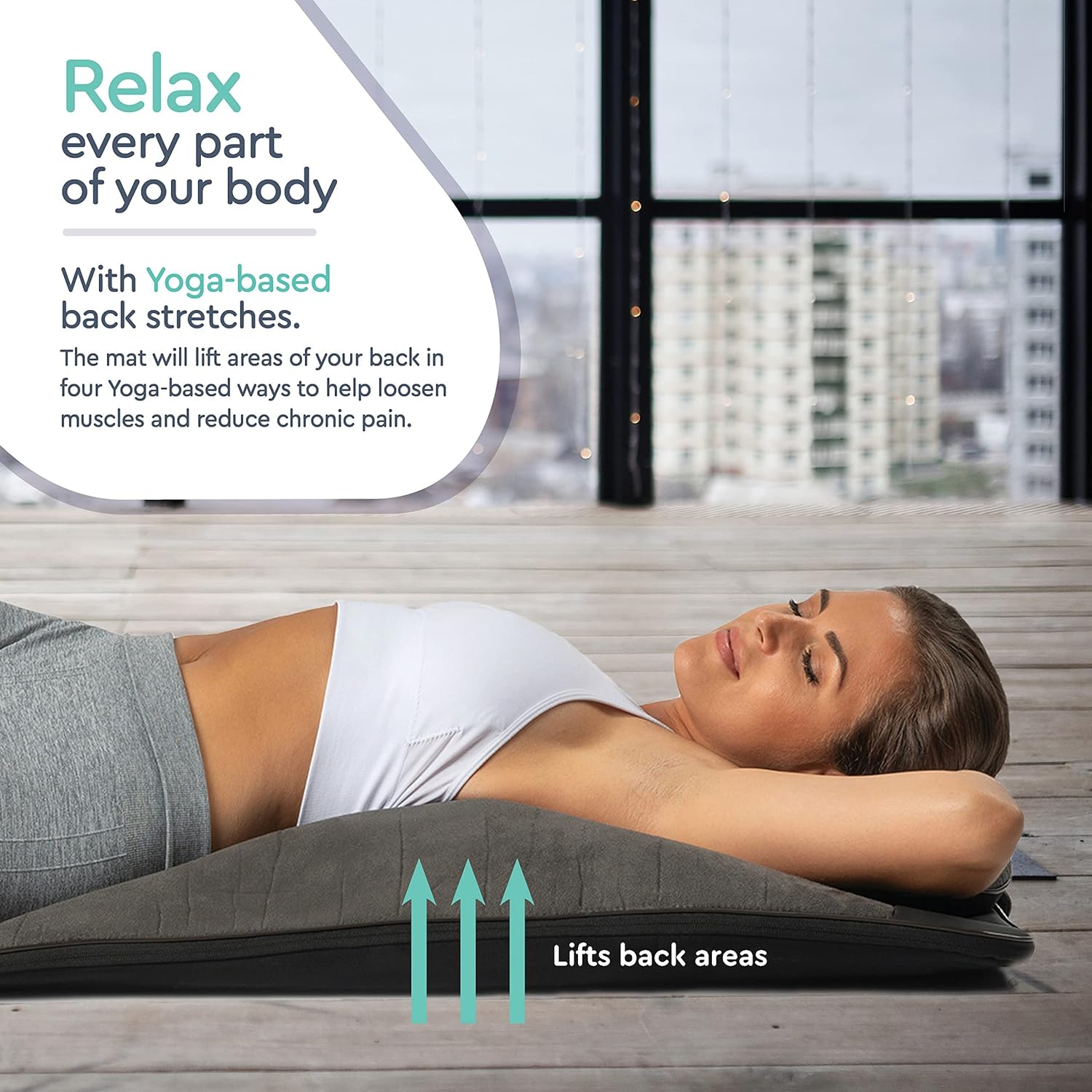 A person lying on the Belmint Back Stretcher, with arrows indicating upward lifting movements from the mat to the back, demonstrating how the mat lifts back areas for relaxation.