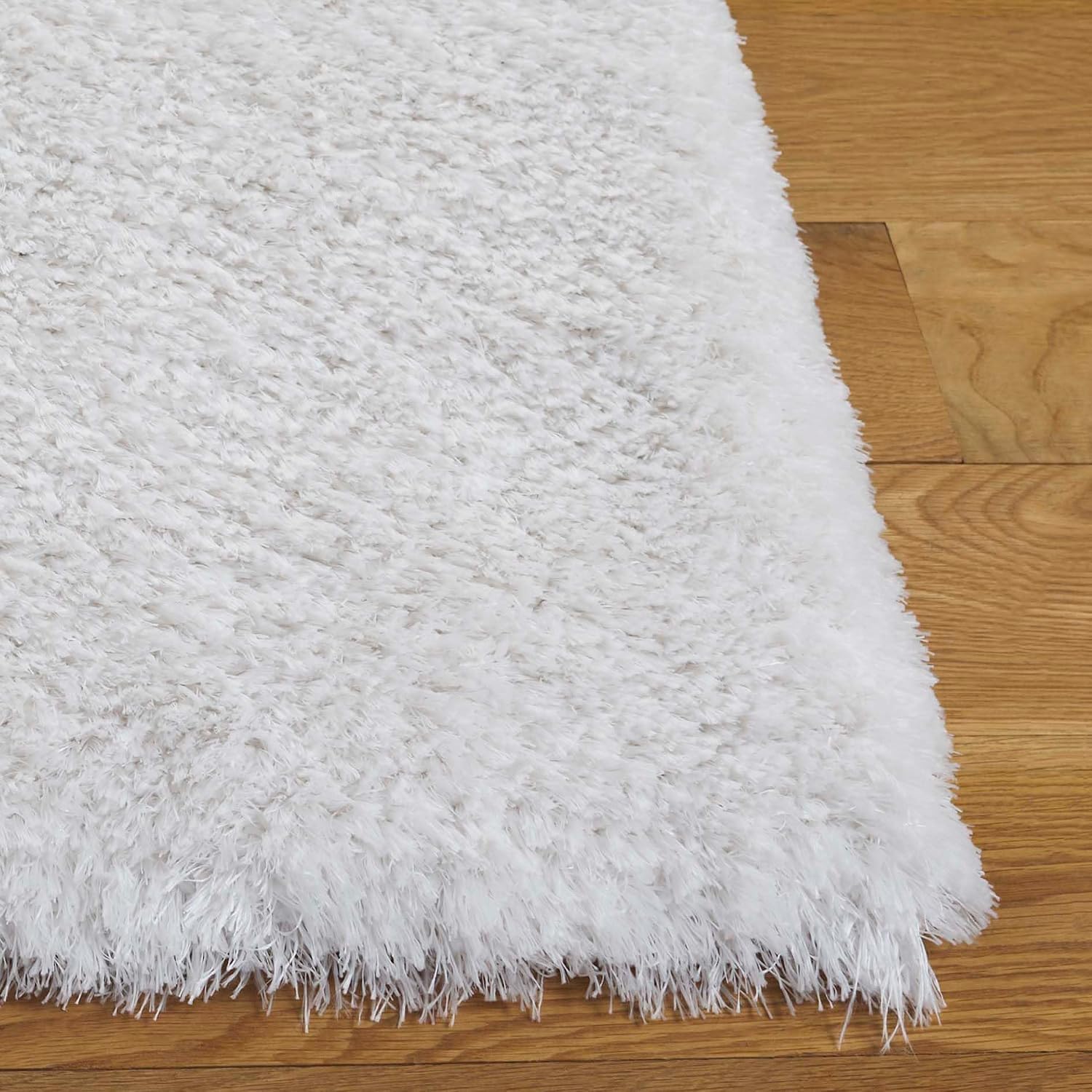 SAFAVIEH Cloud Shag Collection Area Rug - 5'3" x 7'7", White, Modern Glam Abstract 2-inch Thick, 2-inch Thick Ideal for High Traffic Areas in Living Room, Bedroom, Dining (CLD112A-5)