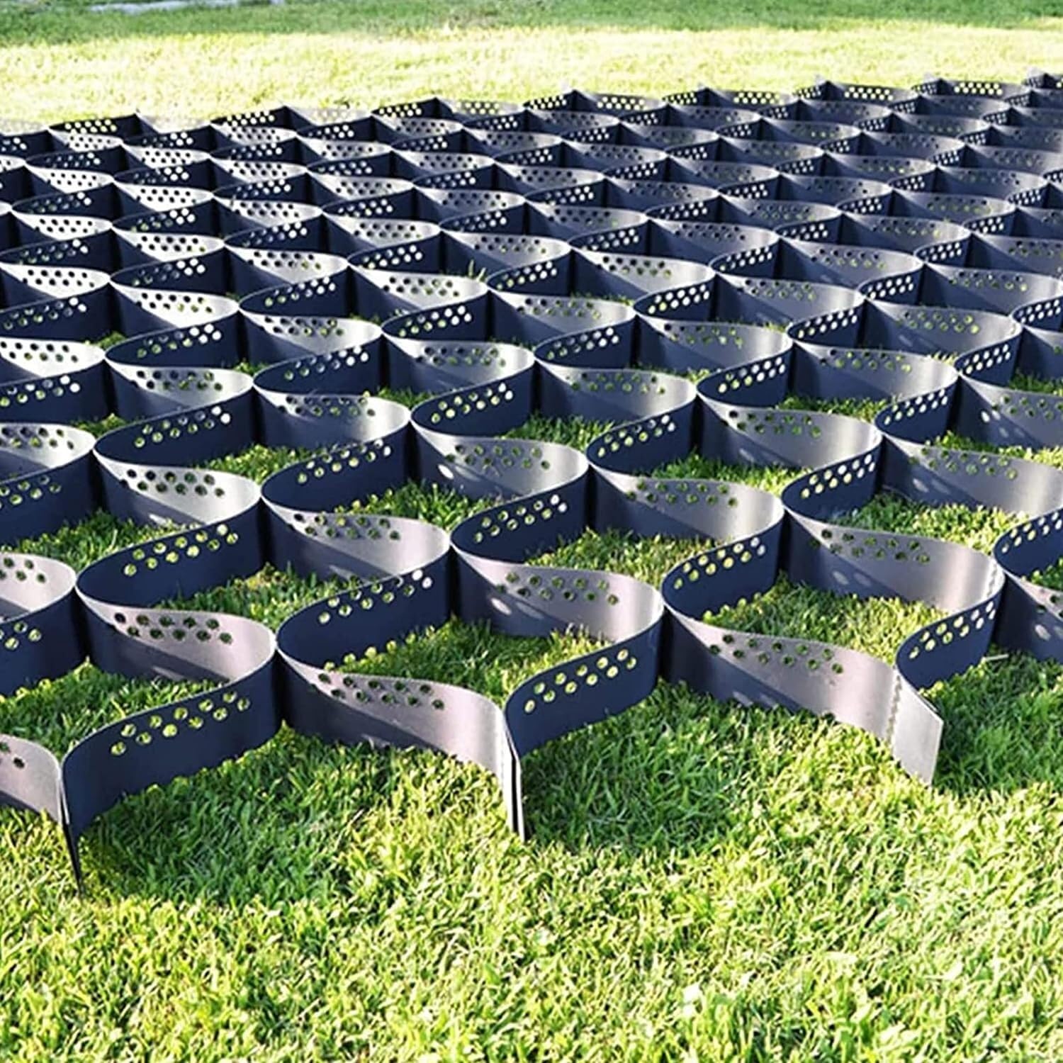 Géogrille extensible anti affaissement pour plateforme routière et sol