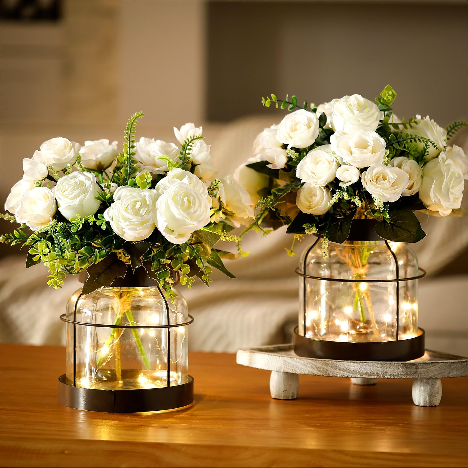 Vase en verre rose de style rétro avec feuillage artificiel lumineux