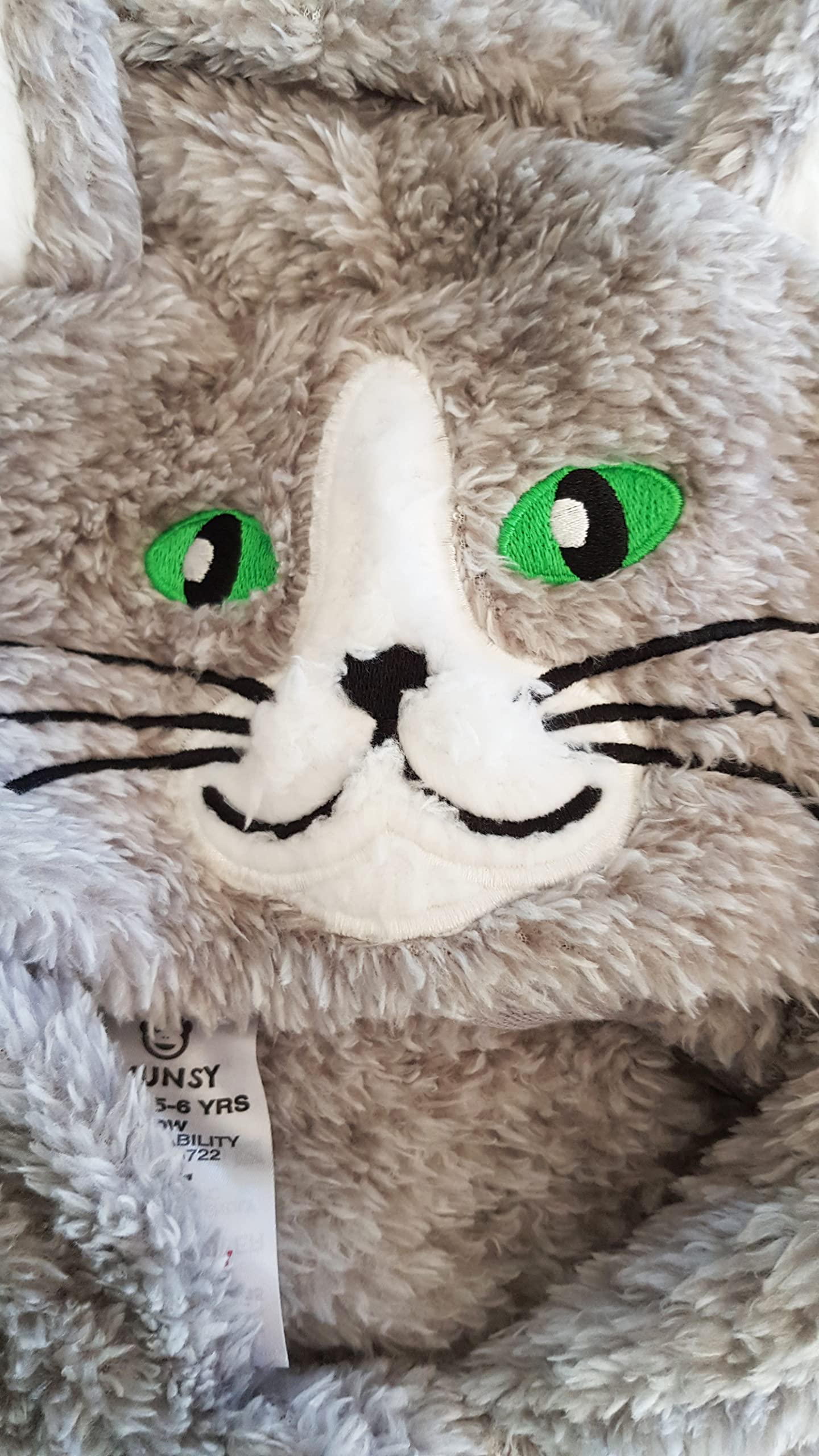Tutina per ragazzi o ragazze in pile super morbido nero bianco gatto gattino con coda – Costume da animale AllinOnes per bambini dai 2 ai 13 anni