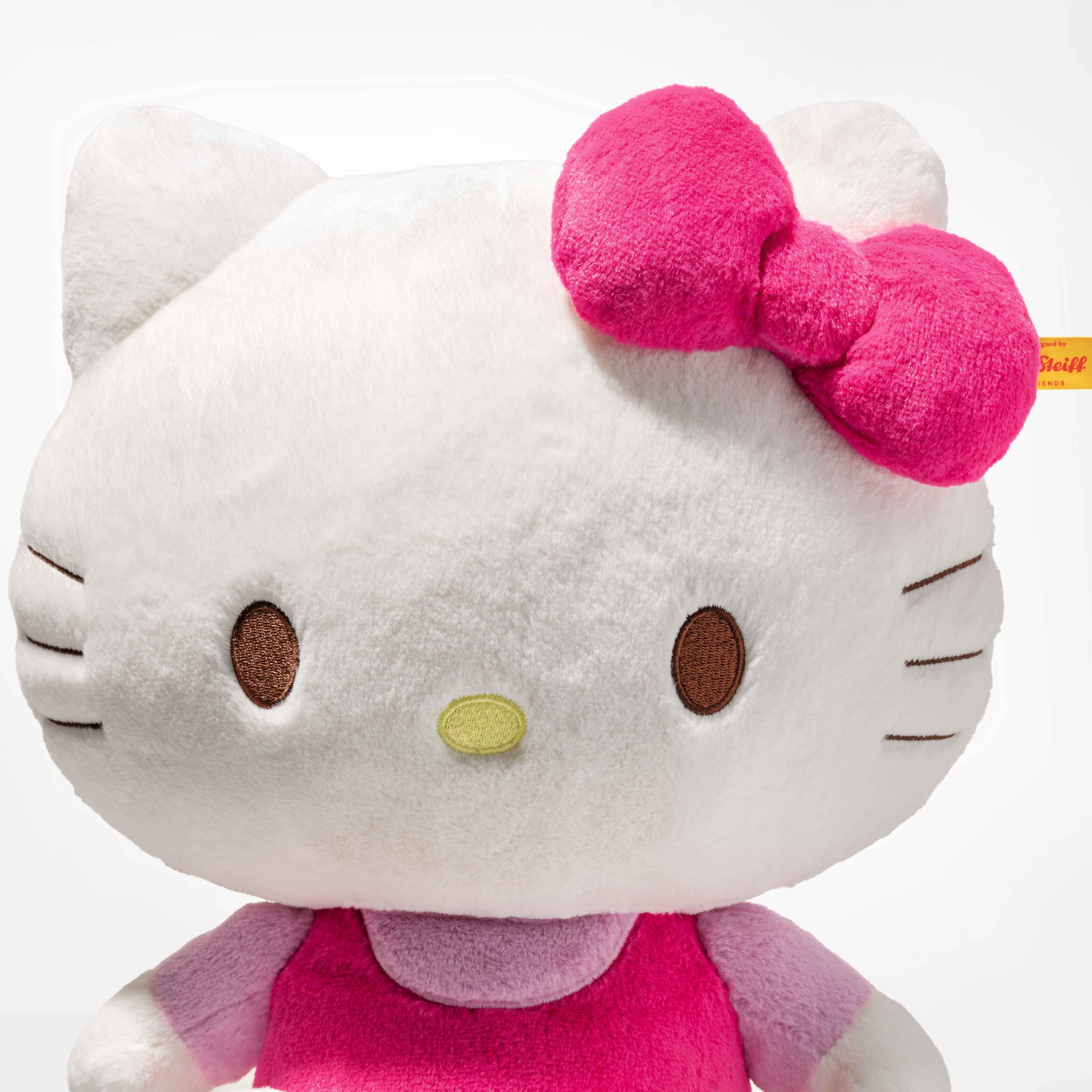 Steiff Peluche de Hello Kitty de 30 cm, Color Blanco con Traje Rosa, Gran Peluche para acurrucarse, para niños y coleccionistas, Lavable a máquina
