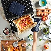 Vista 3 de KitchenAid Juego de 2 soportes para ollas de silicona suave acanalados, color azul tinta, 7 x 9 pulgadas