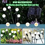 Solar Garden lumières à l'extérieur, paquet de 4 32 LED Solar Purple Firefly Lights Imperméable, Starburst Wind Swaying Light pour l'extérieur de la cour Planter Flower Bed Walkway Décoration de Noël Halloween