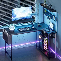 Mesa de jogos de 106 cm, mesa de computador em forma de L com luzes de LED, suporte para monitor, tomadas de energia e gaveta de armazenamento, pequena mesa de jogos com prateleiras e gancho, mesa de