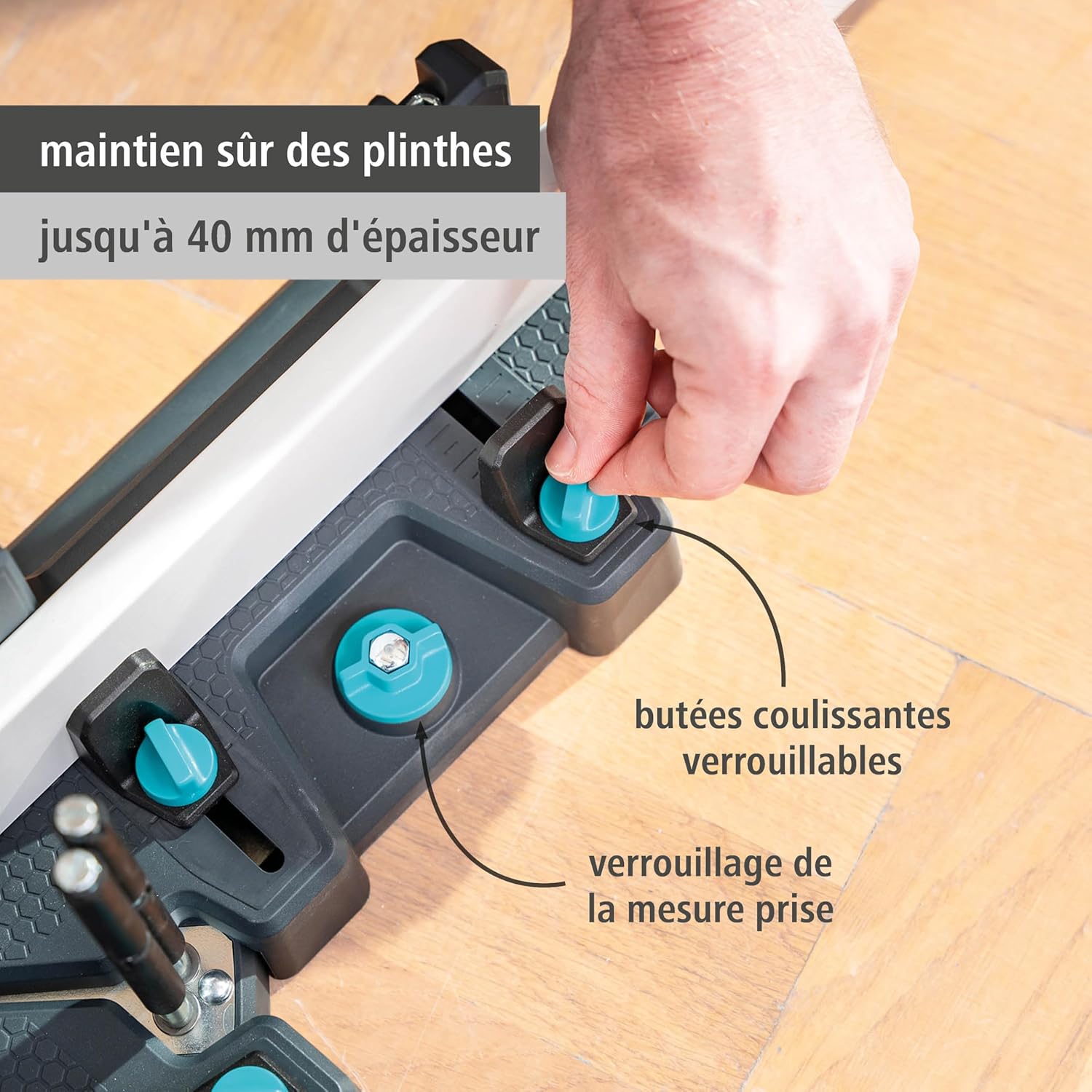 Close-up of the locking mechanism and sliding stops on the wolfcraft miter box.