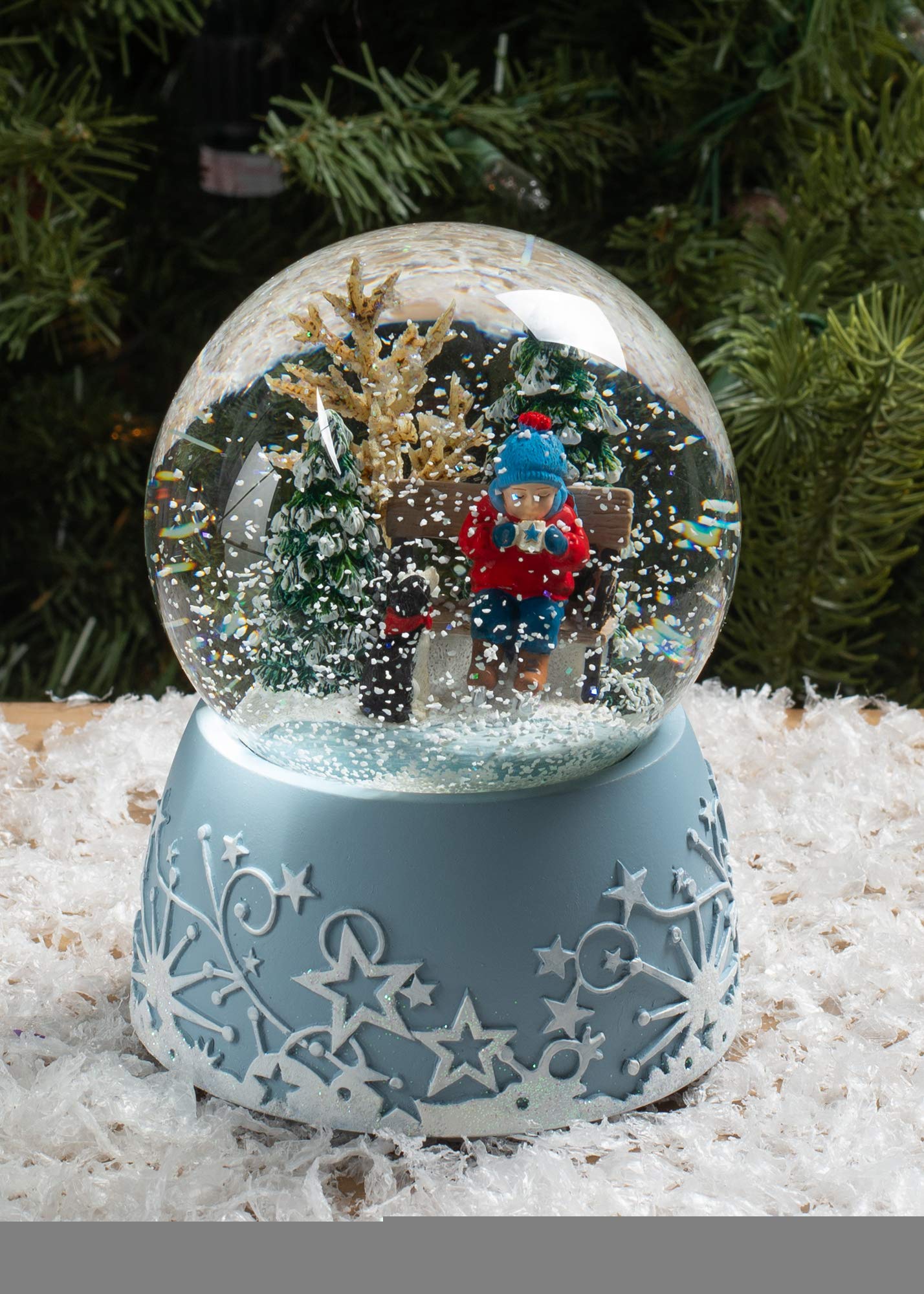Roman Ice Skating Child with Hot Drink 6 Inch Musical Glitter Globe Playing The Tune Jingle Bells