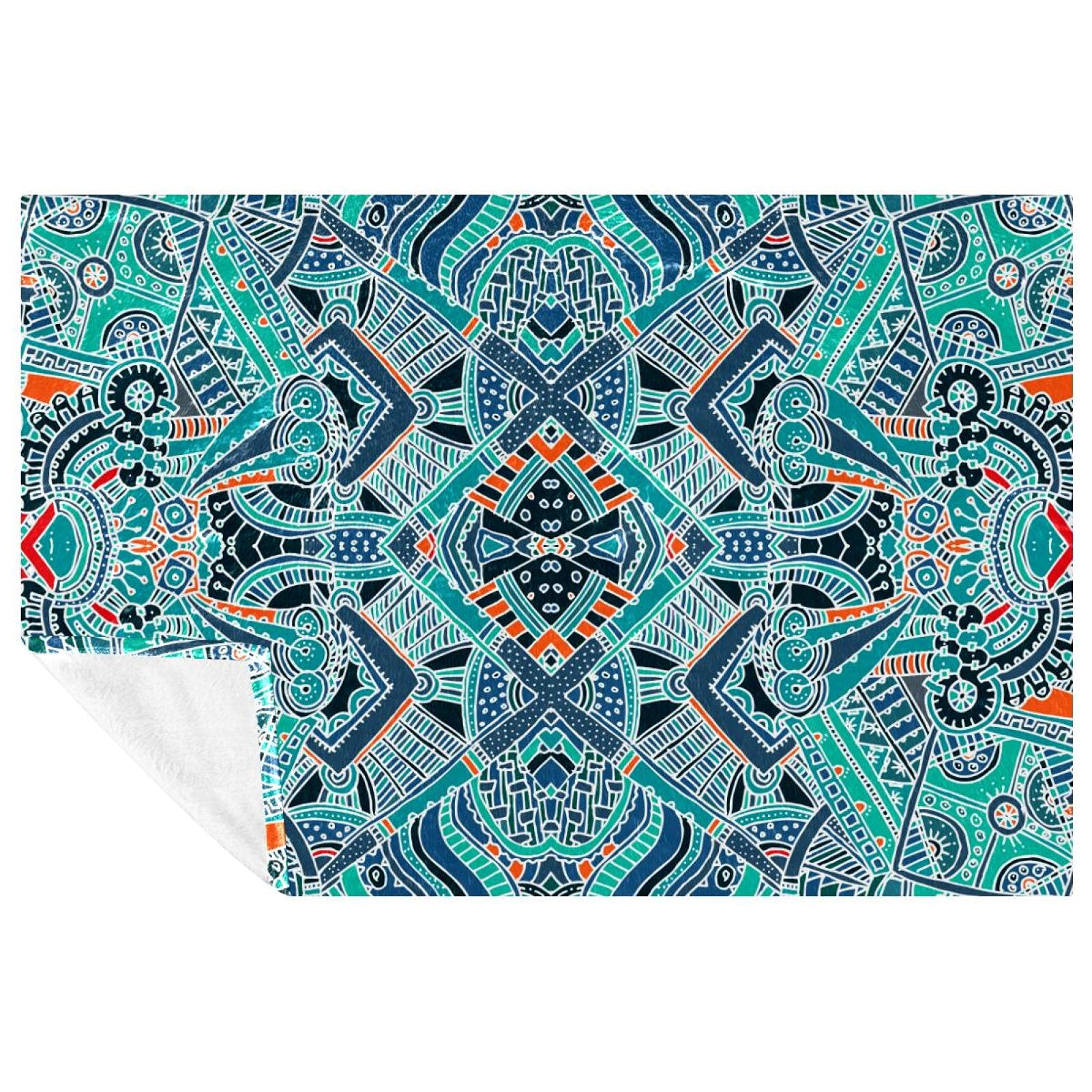 Couverture chaude imprimé mandala pour ne plus avoir froid sur votre canapé