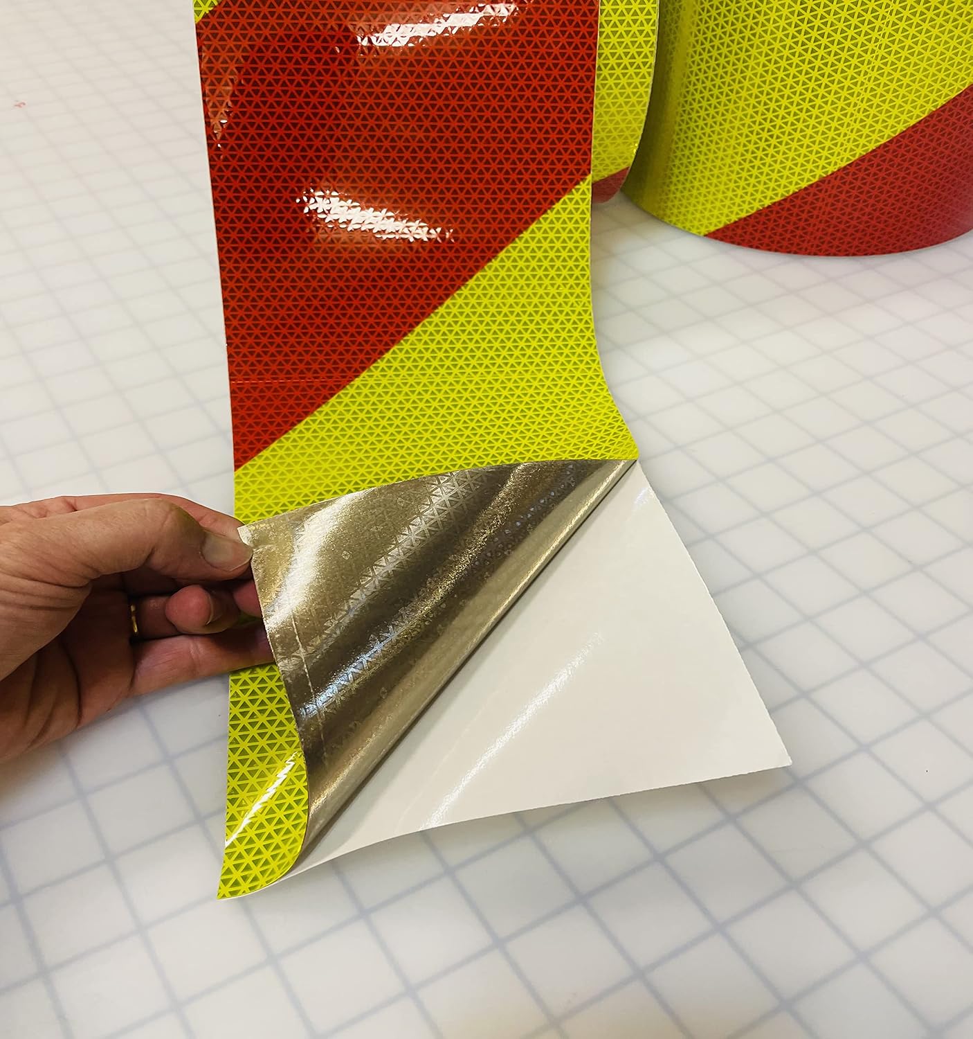 Oralite V98 Prestriped 4" X 10 Foot Red Lime Reflective Chevron Striping Left Slant