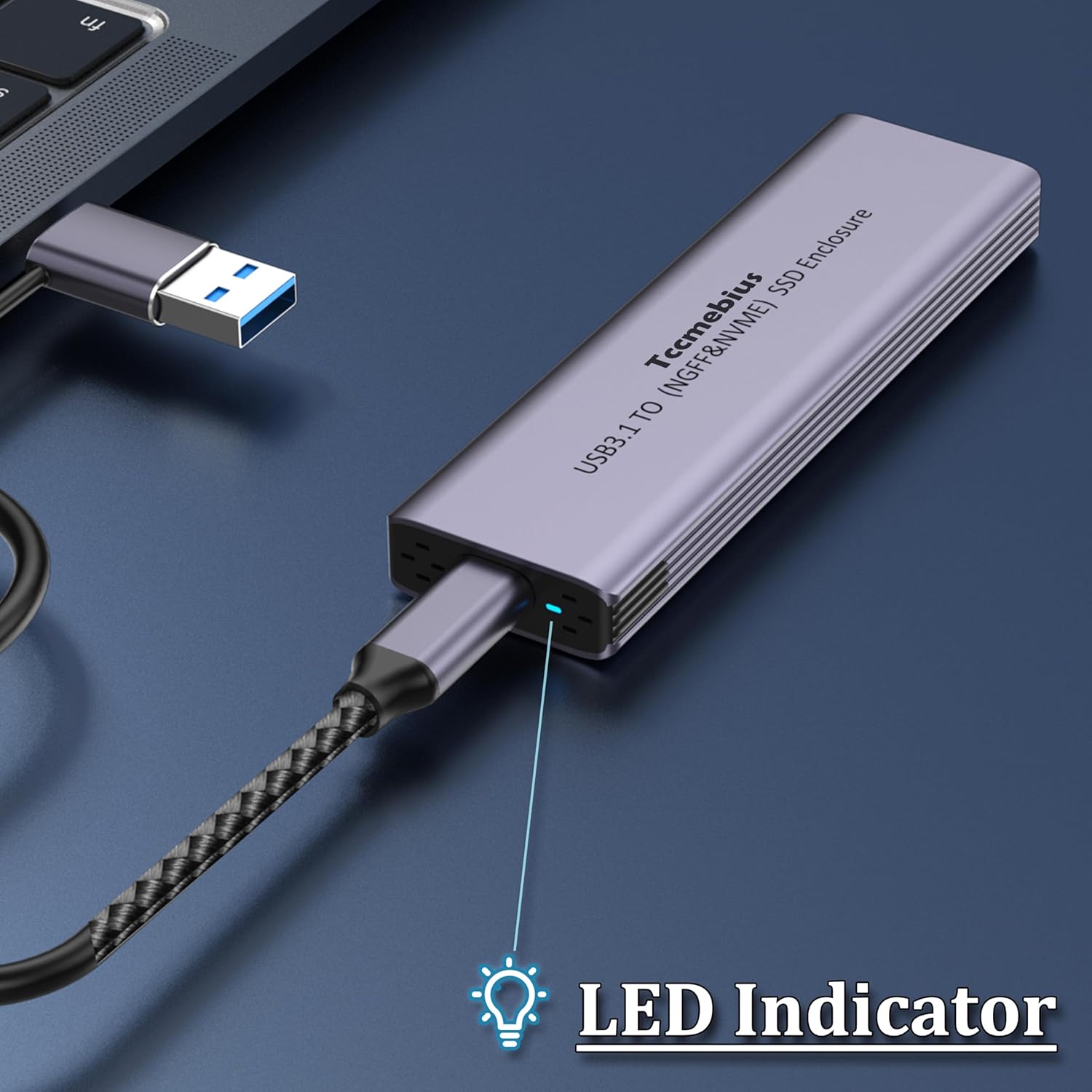 Close-up of the Tccmebius M.2 NVMe SSD Enclosure showing a blue LED indicator light, signifying active operation.