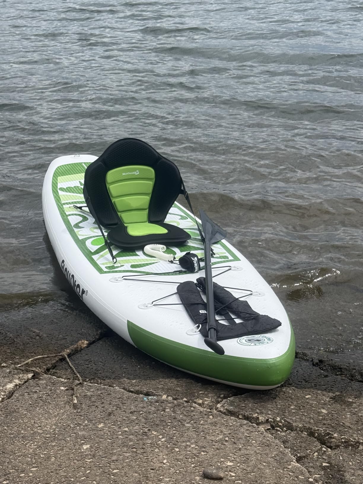 Inflatable paddle board rolled up for transport