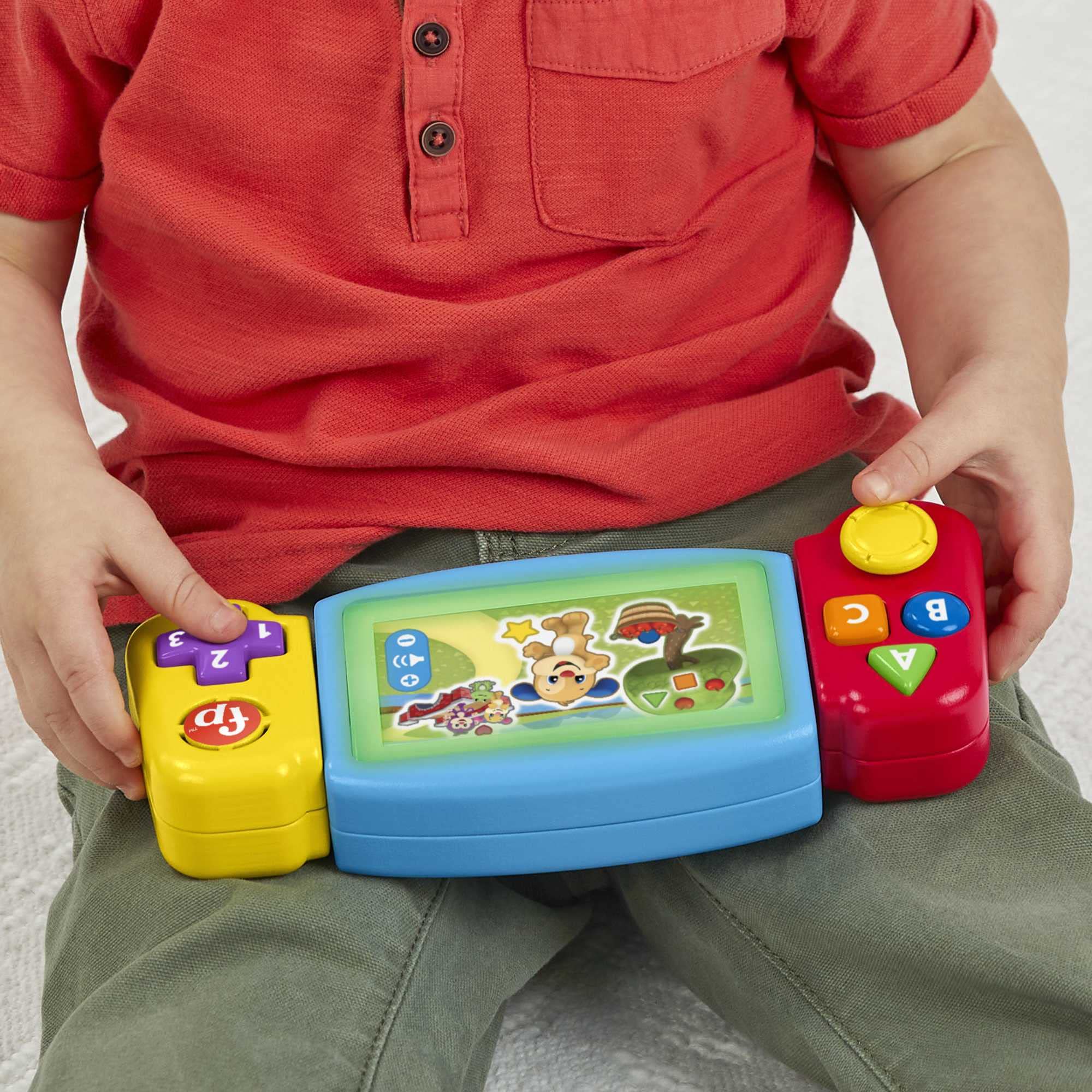 Fisher-Price Konsola ABC Małego Gracza „Ucz się i śmiej!” Konsola ze światełkami, dźwiękami i piosenkami edukacyjnymi, do ćwiczenia zręczności, wersja z wyborem języka, polska wersja językowa, HNN39