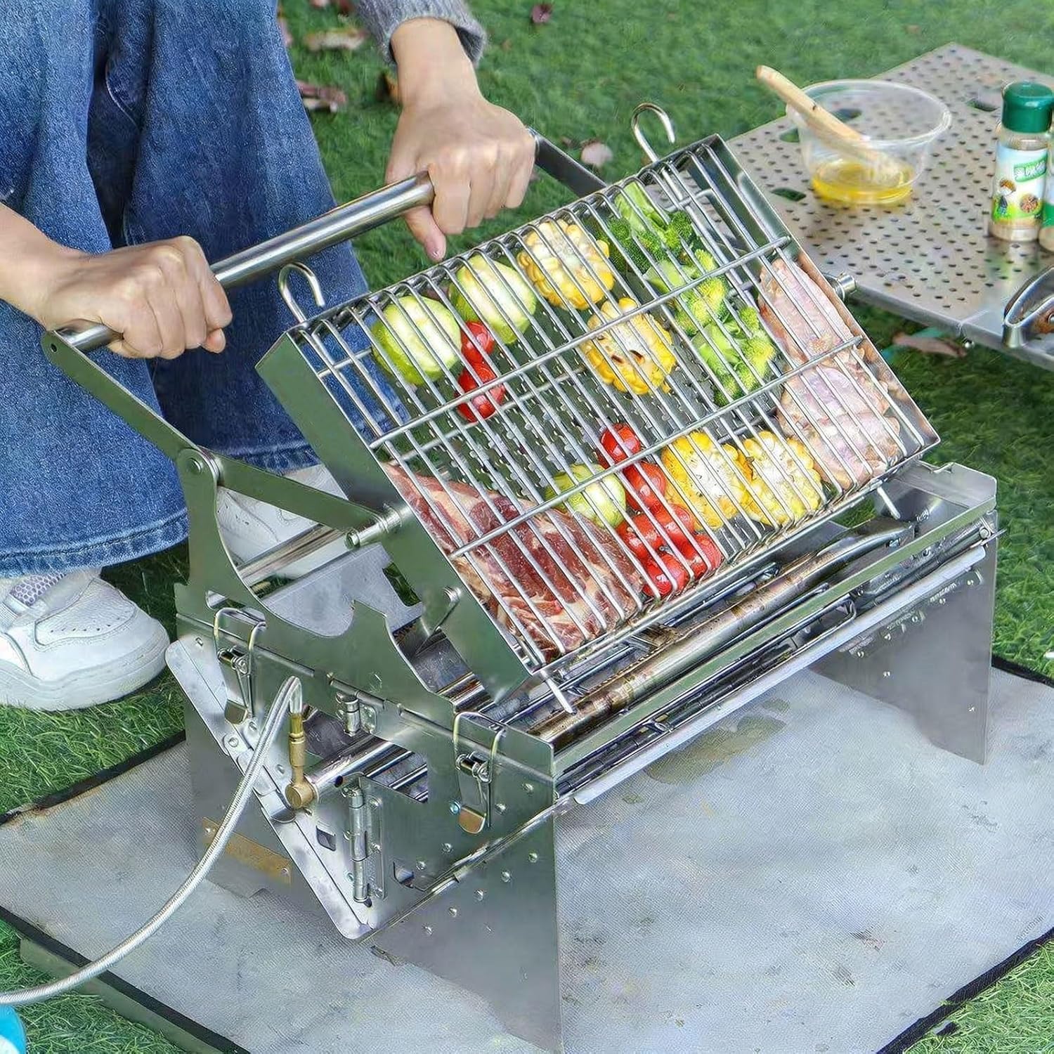 Przenośny grill na węgiel drzewny obracany o 360°, składany grill ze stali nierdzewnej na kemping i gotowanie na podwórku