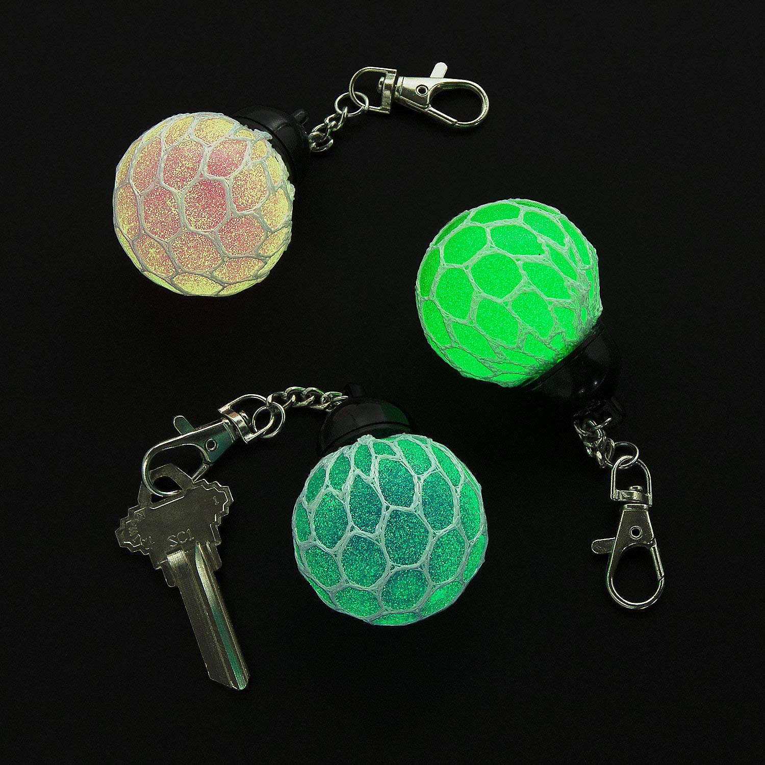 Fun ExpressGlow-in-the-Dark Mesh-Covered Squeeze Ball Backpack Clips - Apparel Accessories - 12 Pieces