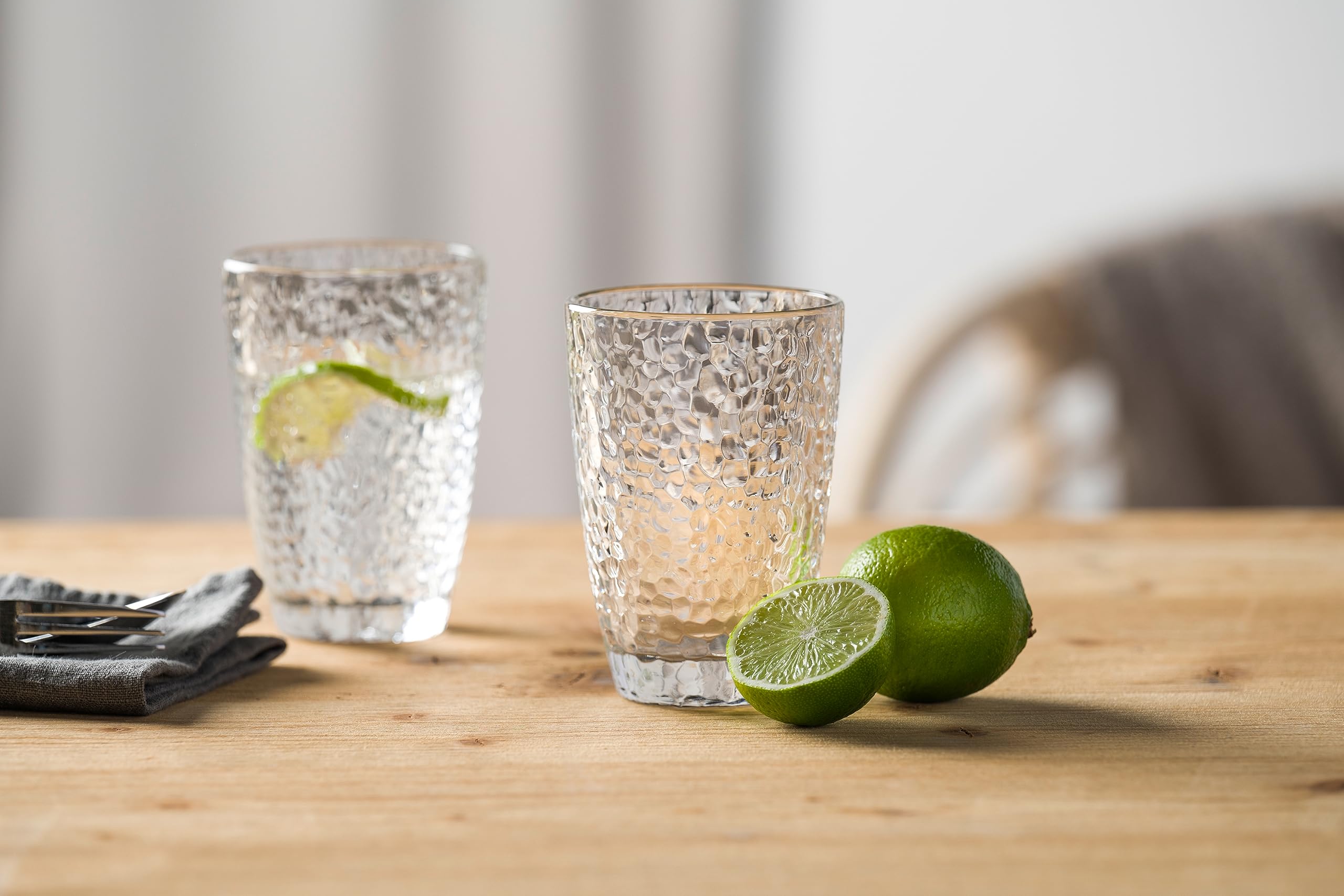 Leonardo Matera 077408 Lot de 4 verres à boire en verre de qualité supérieure aspect martelé Capacité 340 ml Passe au lave-vaisselle Robuste Transparent