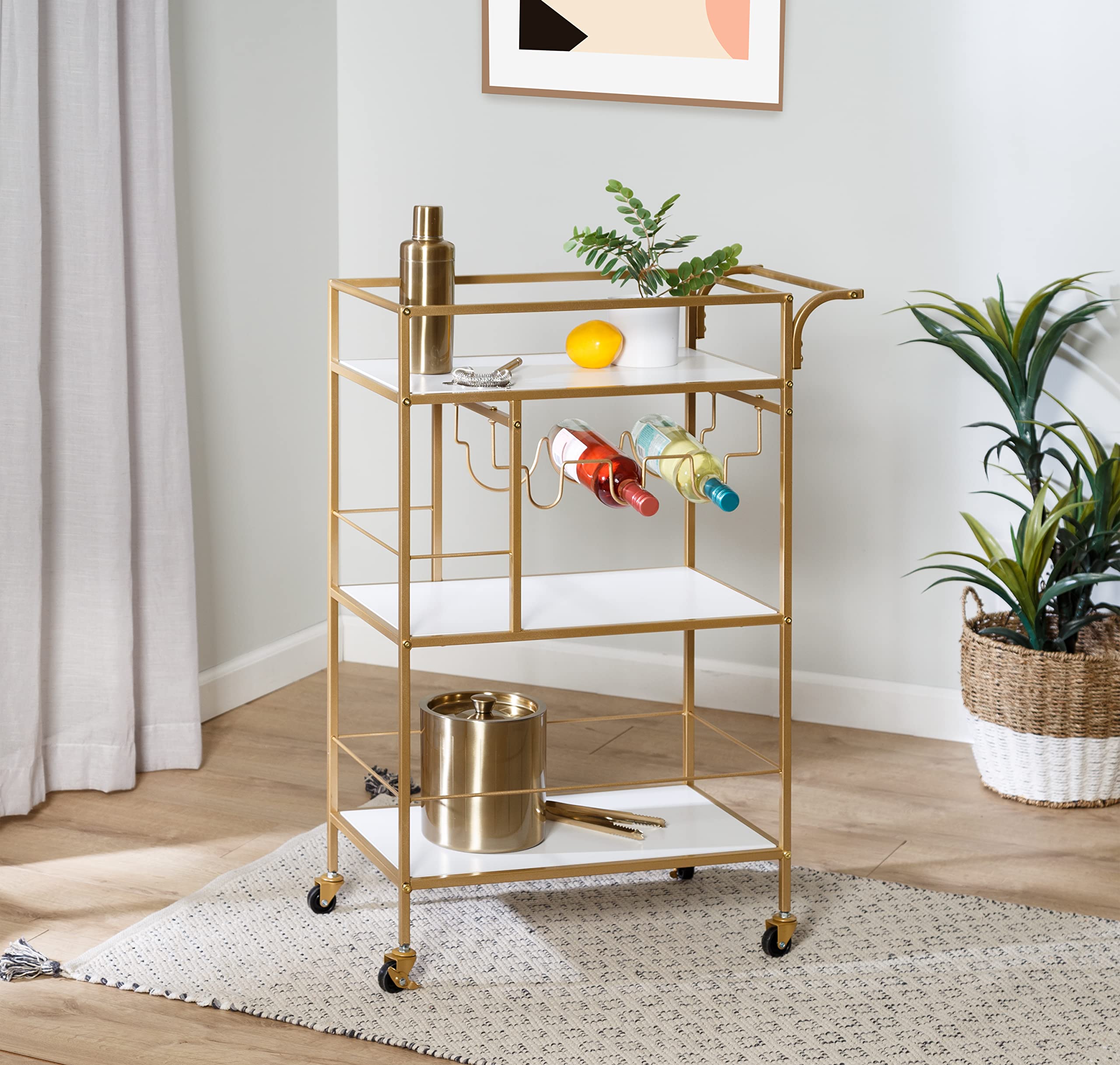 Carrito de servir para cenas y fiestas en casa con diseño elegante de oro