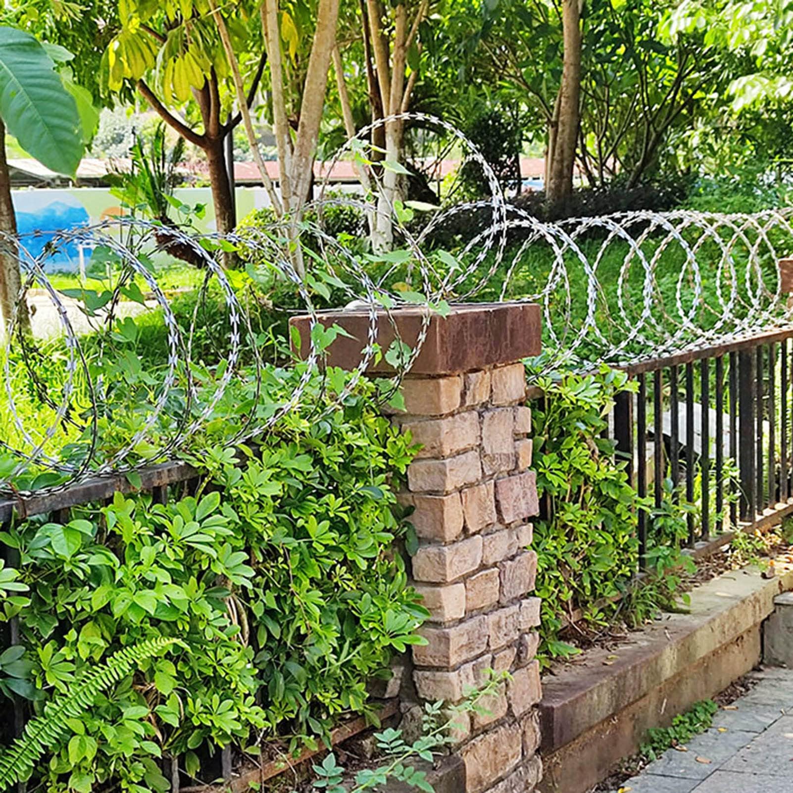 Rollo de alambre galvanizado para seguridad de vallas, disuasorio de cinta de púas resistente, diseño en espiral resistente a la intemperie para protección de jardín y patio