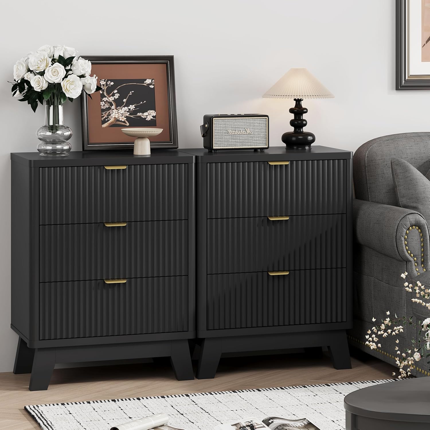 Close-up of nightstand features: metal handle, fluted panel, curved edge, stable base