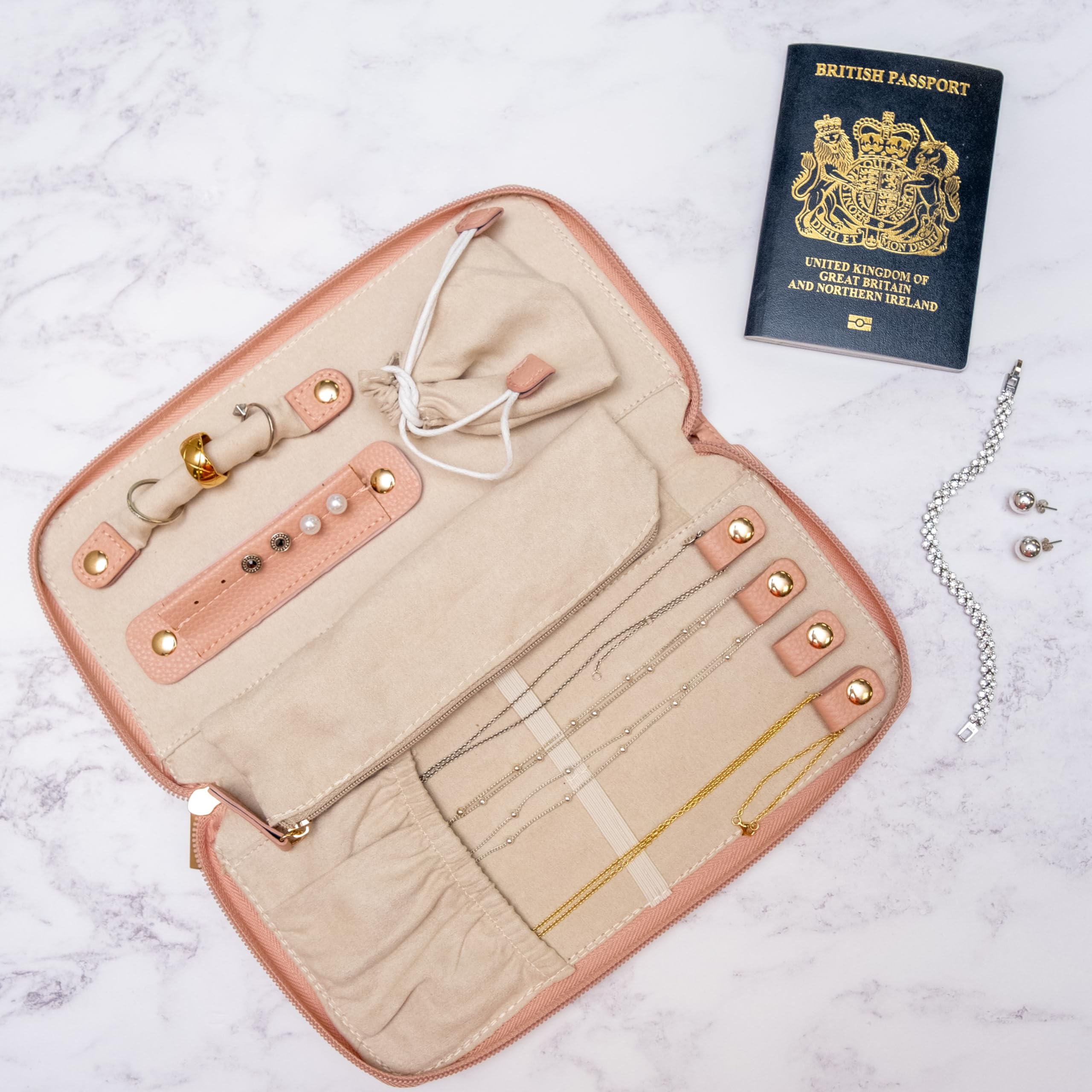 TRIXES Cartera de viaje para joyas, soporte de piel vegana rosa con cremallera para anillos, pendientes, pulseras y collares, etc. - Accesorio esencial de viaje