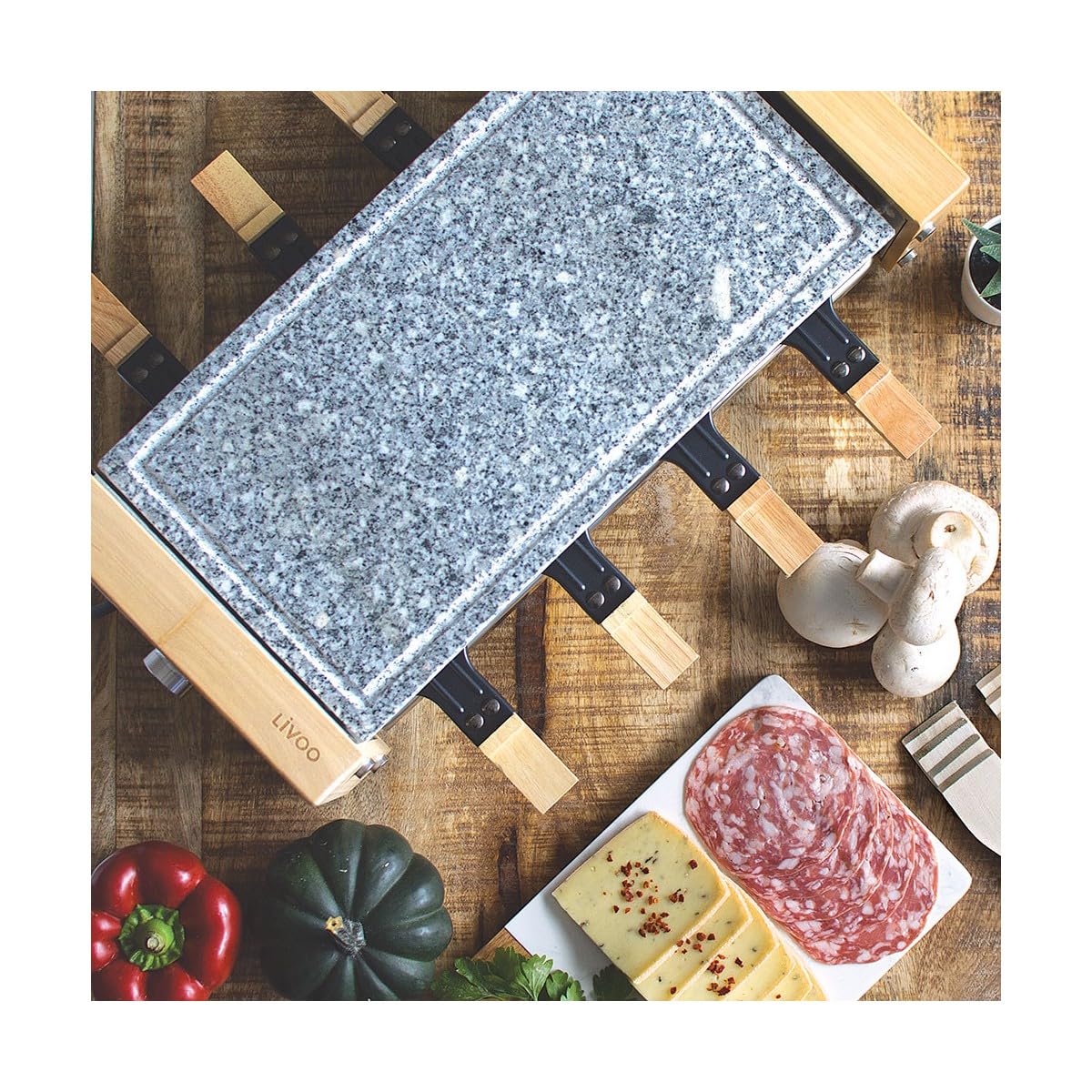 Livoo - Appareil à raclette 8 personnesDOC219 - finition bois véritable, avec gril en granite, 8 caquelons + 8 spatules en bois inclus