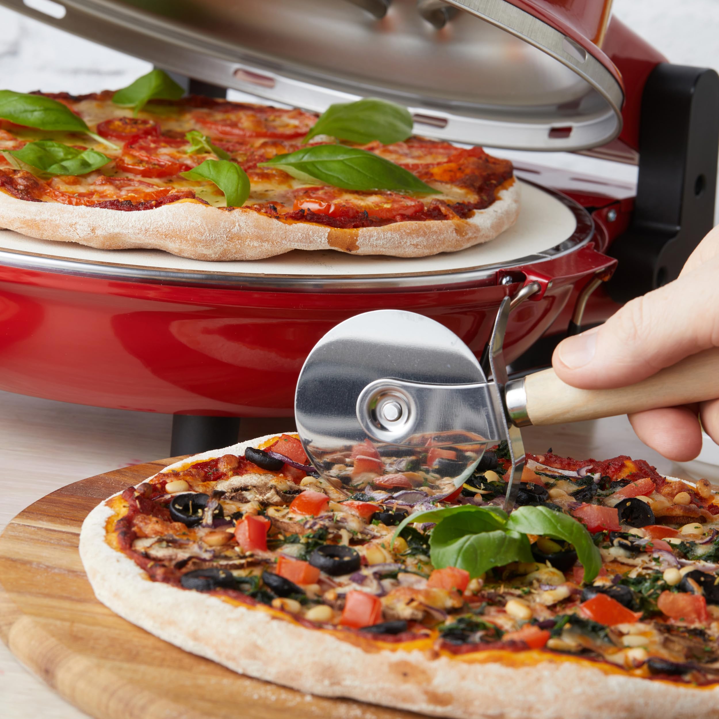 Petra PT5666VDE Horno eléctrico para pizza - interior, 1200 W, 5 niveles de temperatura, precalentamiento rápido, pizzas de 12 pulgadas en 5 minutos, piedra para pizza extraíble, cortador y 2 paletas
