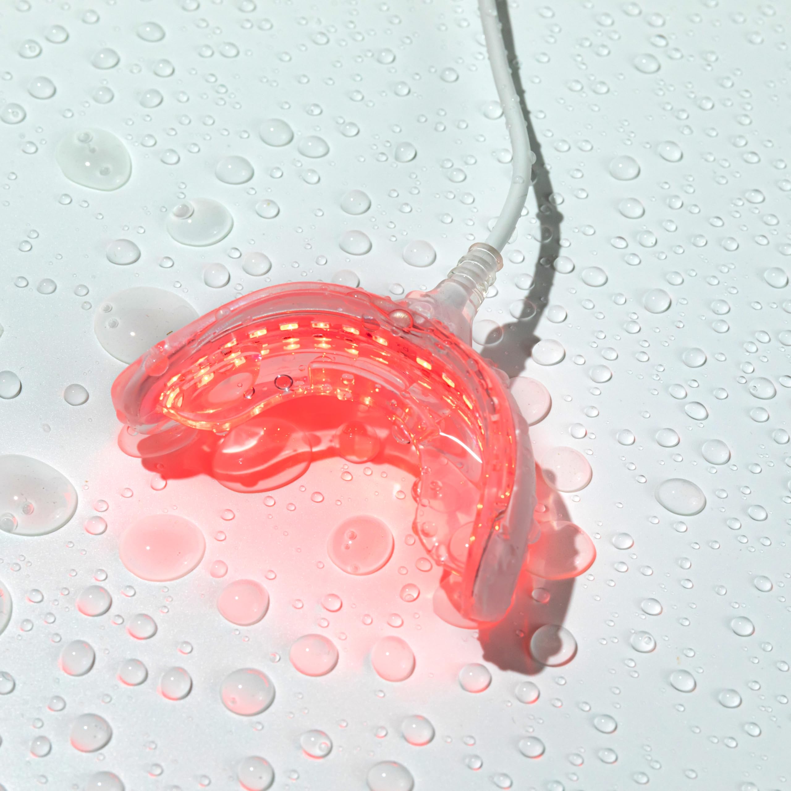 Dispositivo oral de luz roja, solución avanzada de terapia de encías y alivio del dolor de muelas, con 32 luces LED. Incluye adaptadores USB, iPhone y Android para un uso cómodo