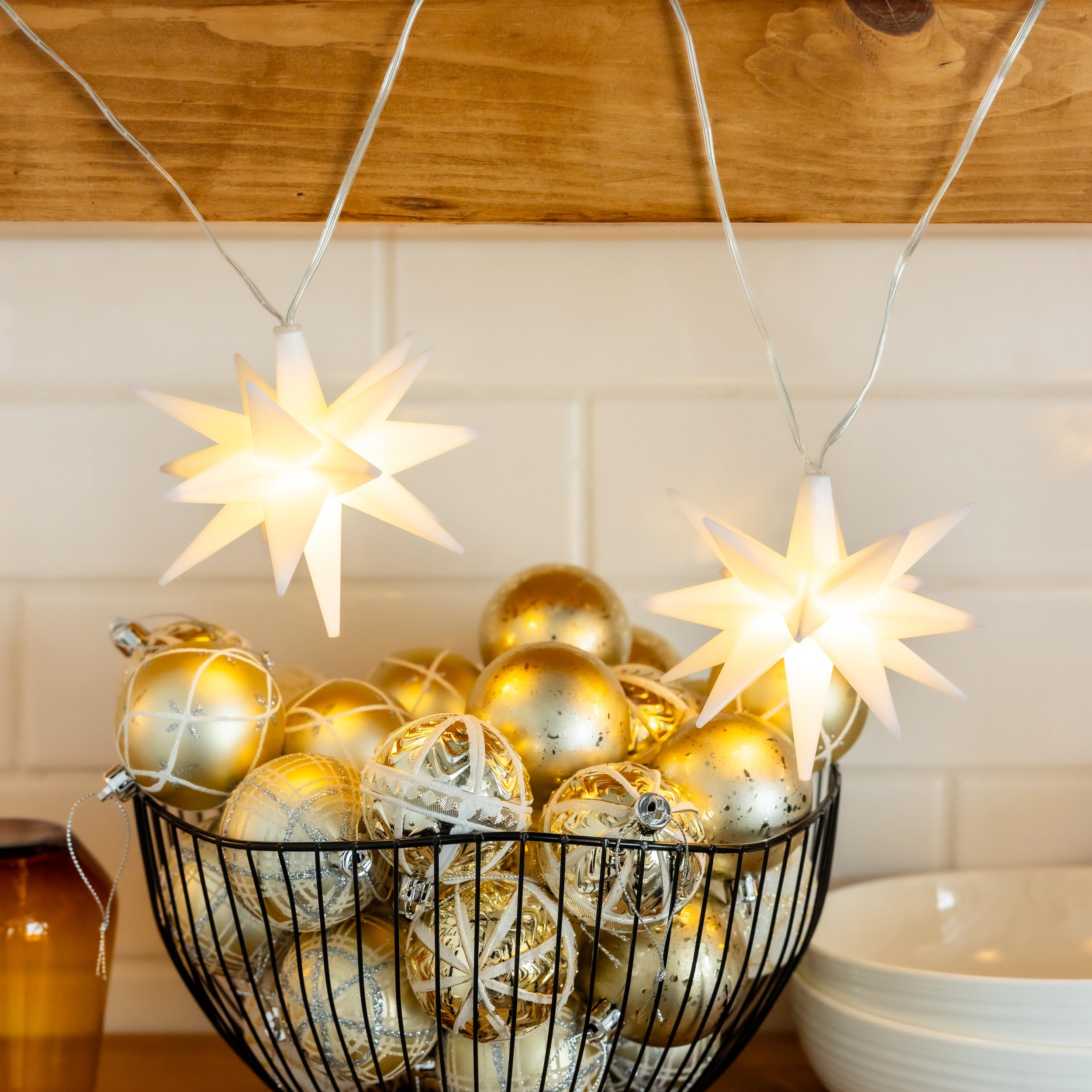 Elf Logic Juego de ocho mini luces LED de 4 pulgadas con forma de estrella morava. Luces de Navidad colgantes al aire libre, decoración de vacaciones, luces de porche, estrellas de Adviento o luces de