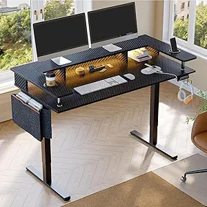 Bestier LED Electric Standing Desk Adjustable Height, 58x26 Inch Large Sit Stand Desk with Monitor Stand, Ergonomic Rising Office Workstation, Headphone Hook & Storage Bag