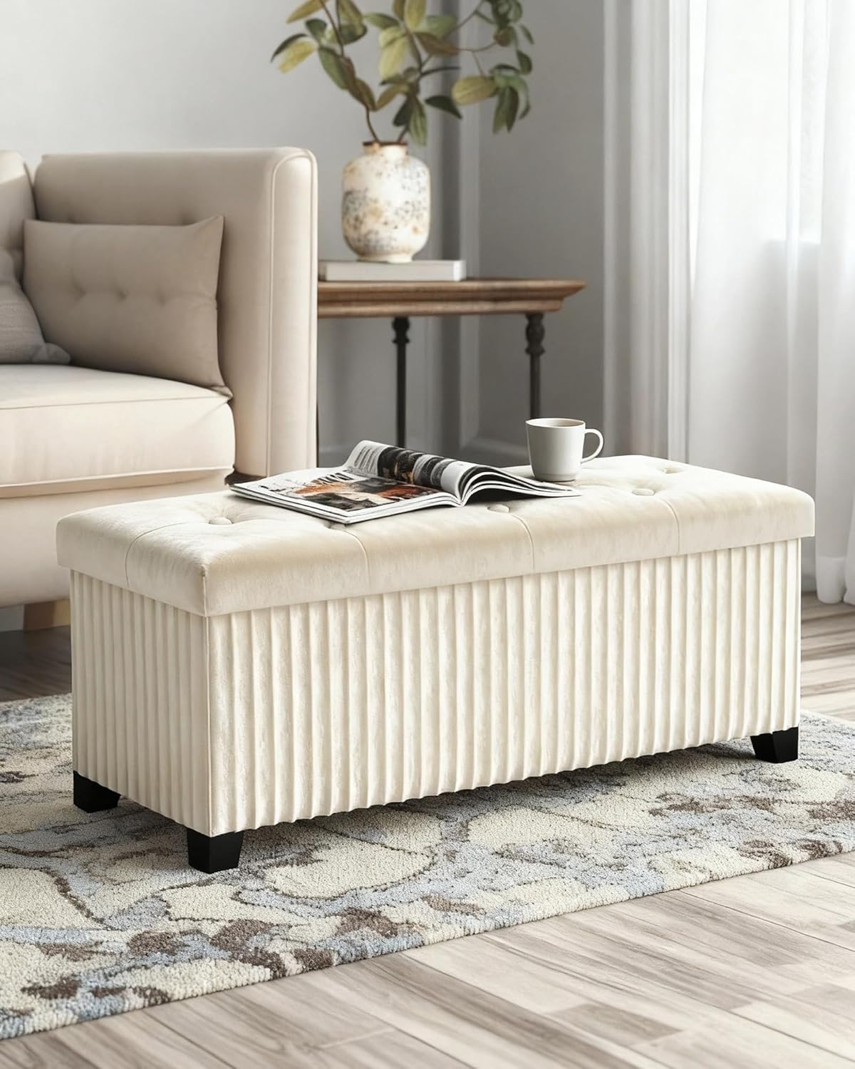LITZFUR Storage Ottoman Bench, 43 Inch Foldable Ottoman with Legs, Velvet Foot Rest Stool, End of Bed Bench, Storage Chest for Living Room, Bedroom (Beige)