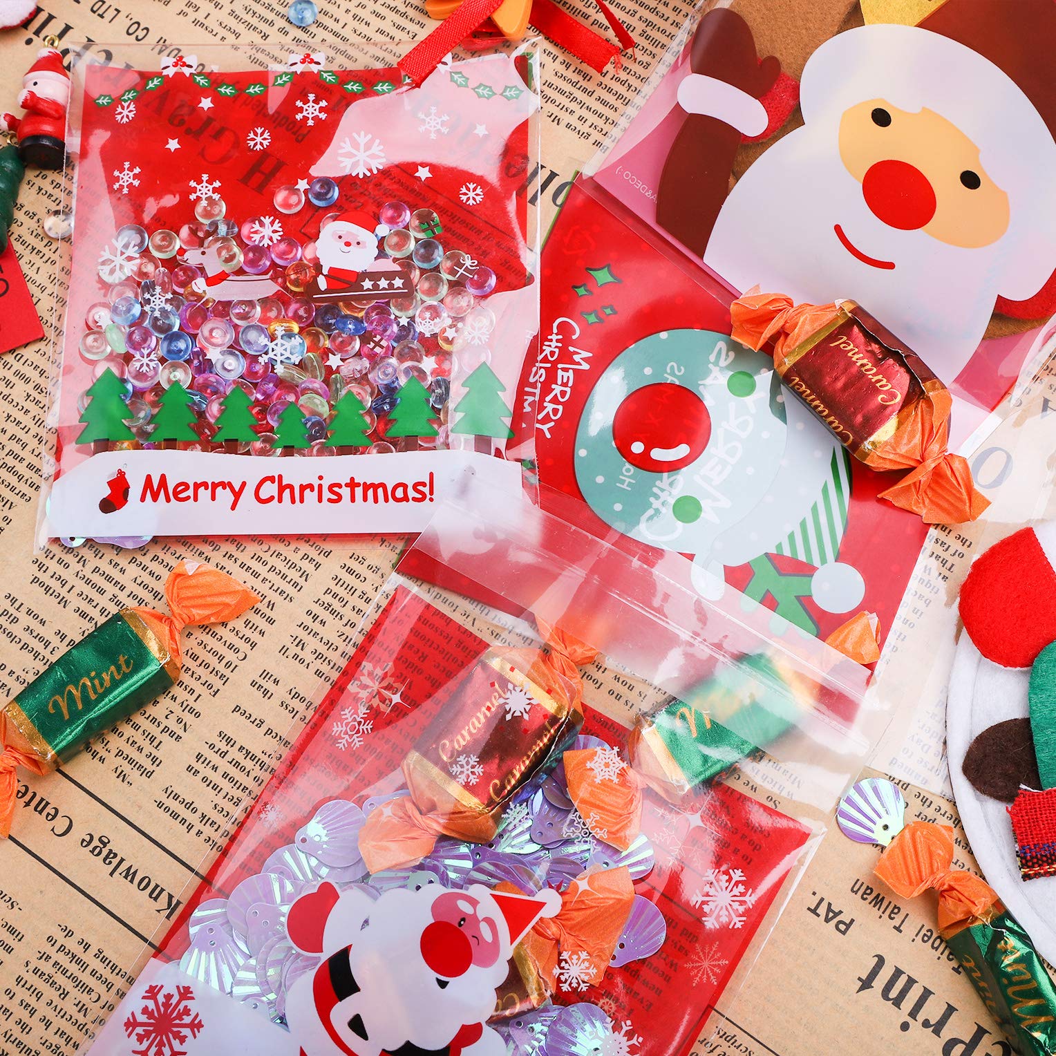 VIDILLO 400 Süßigkeitentüten Weihnachtlich – Selbstklebend, Transparent, 10x14 Cm, 4 Motive (Rentier, Weihnachtsmann, Baum, Schneemann)