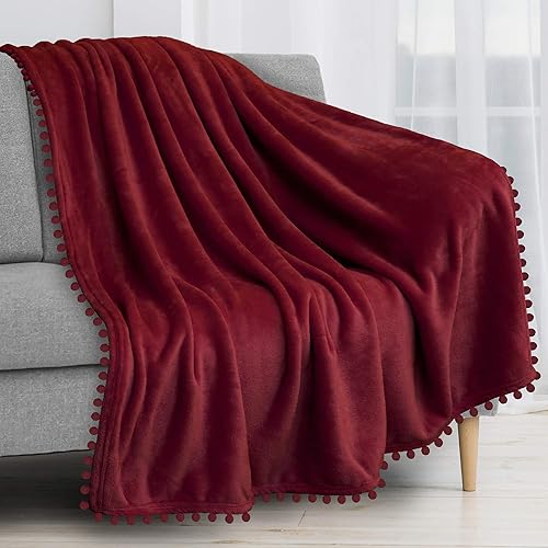 PAVILIA Manta con pompones, color rojo oscuro vino, manta de vellón suave con flecos para sofá, cama, sofá, manta decorativa y acogedora de franela