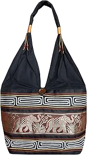 Borsa a tracolla in cotone con fantasia ricamata e logo in legno di cocco con elefanti intagliati.
