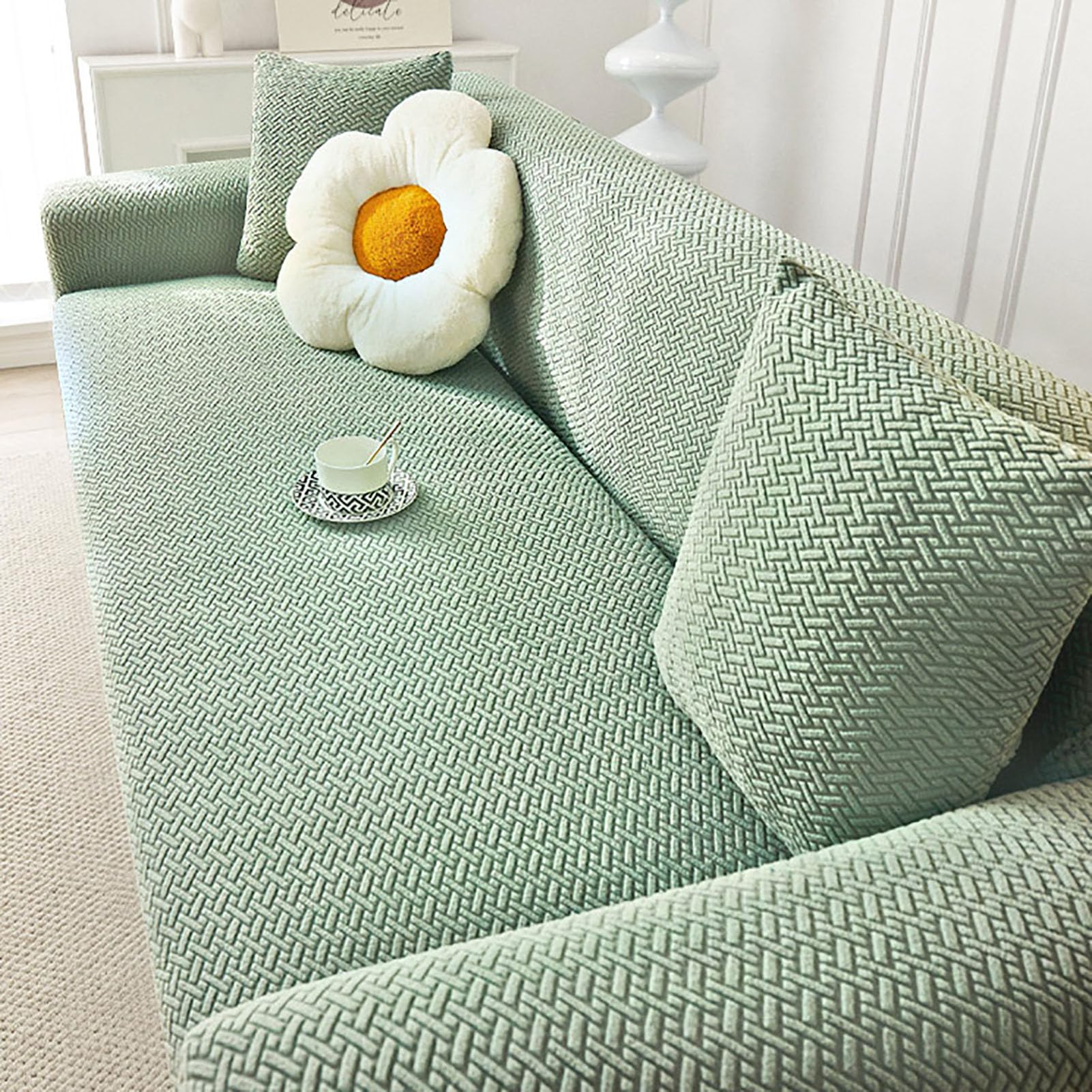 Housse canapé velours vert 1 place pour un salon chaleureux et cosy en famille