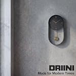 Driini Modern Pendulum Wall Clock - Decorative and Unique Metal Frame, with 8 Inch Face - Contemporary, Minimalist Design, with Silent Battery Operation - Includes Both Black and Gold Pendelum