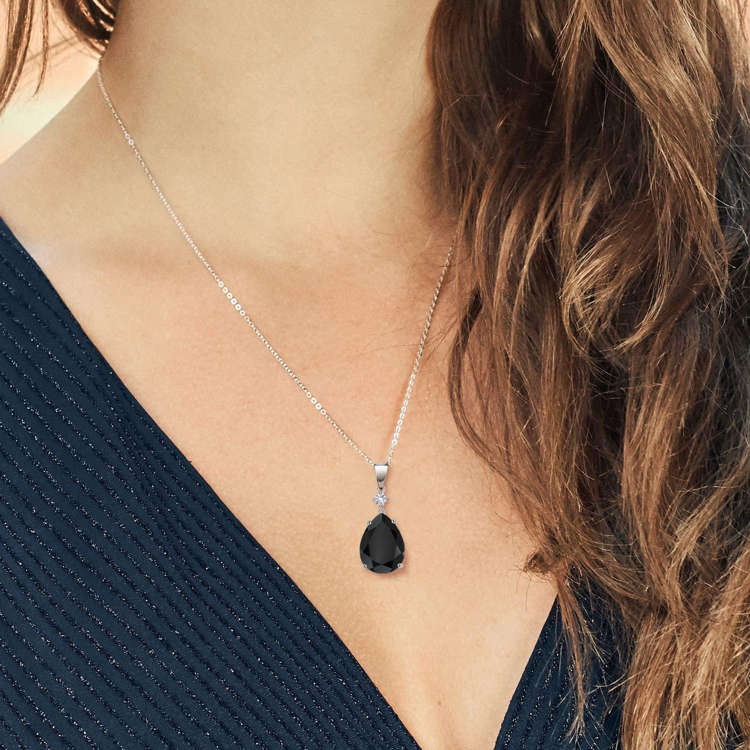 Gem Stone King 925 Sterling Silver Black Onyx and White Created Sapphire Pendant Necklace For Women (7.50 Cttw, Pear Shape 16X12MM, Gemstone, with 18 Inch Chain)